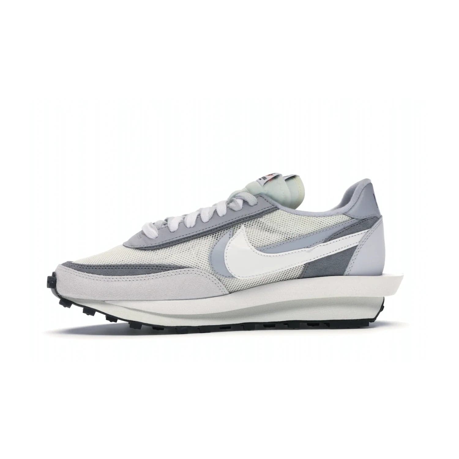 Nike LD Waffle sacai Summit White - Image 18 - Only at www.BallersClubKickz.com - Mesh fashion and comfort into your wardrobe with the Nike LD Waffle Sacai Summit White. Featuring a white upper, grey accents and overlapped white and grey Nike "Swoosh," these sneakers offer perfect balance of comfort and style. Perfect for office or a night out.