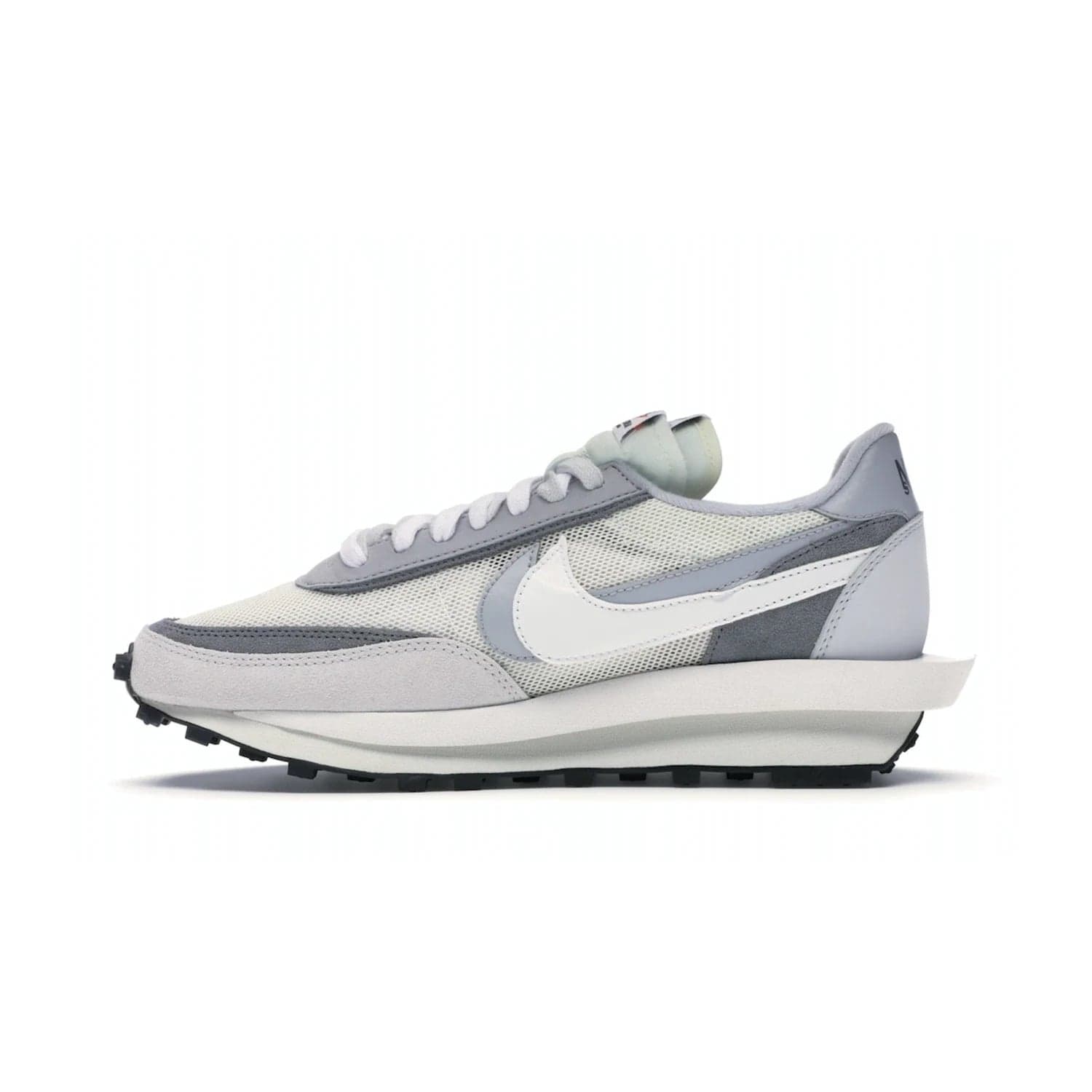 Nike LD Waffle sacai Summit White - Image 19 - Only at www.BallersClubKickz.com - Mesh fashion and comfort into your wardrobe with the Nike LD Waffle Sacai Summit White. Featuring a white upper, grey accents and overlapped white and grey Nike "Swoosh," these sneakers offer perfect balance of comfort and style. Perfect for office or a night out.