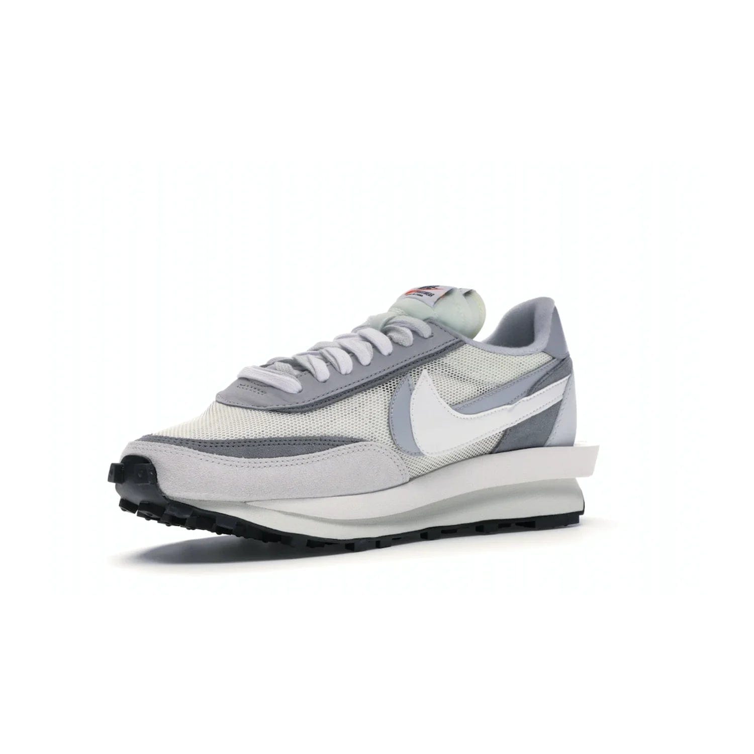 Nike LD Waffle sacai Summit White - Image 15 - Only at www.BallersClubKickz.com - Mesh fashion and comfort into your wardrobe with the Nike LD Waffle Sacai Summit White. Featuring a white upper, grey accents and overlapped white and grey Nike "Swoosh," these sneakers offer perfect balance of comfort and style. Perfect for office or a night out.