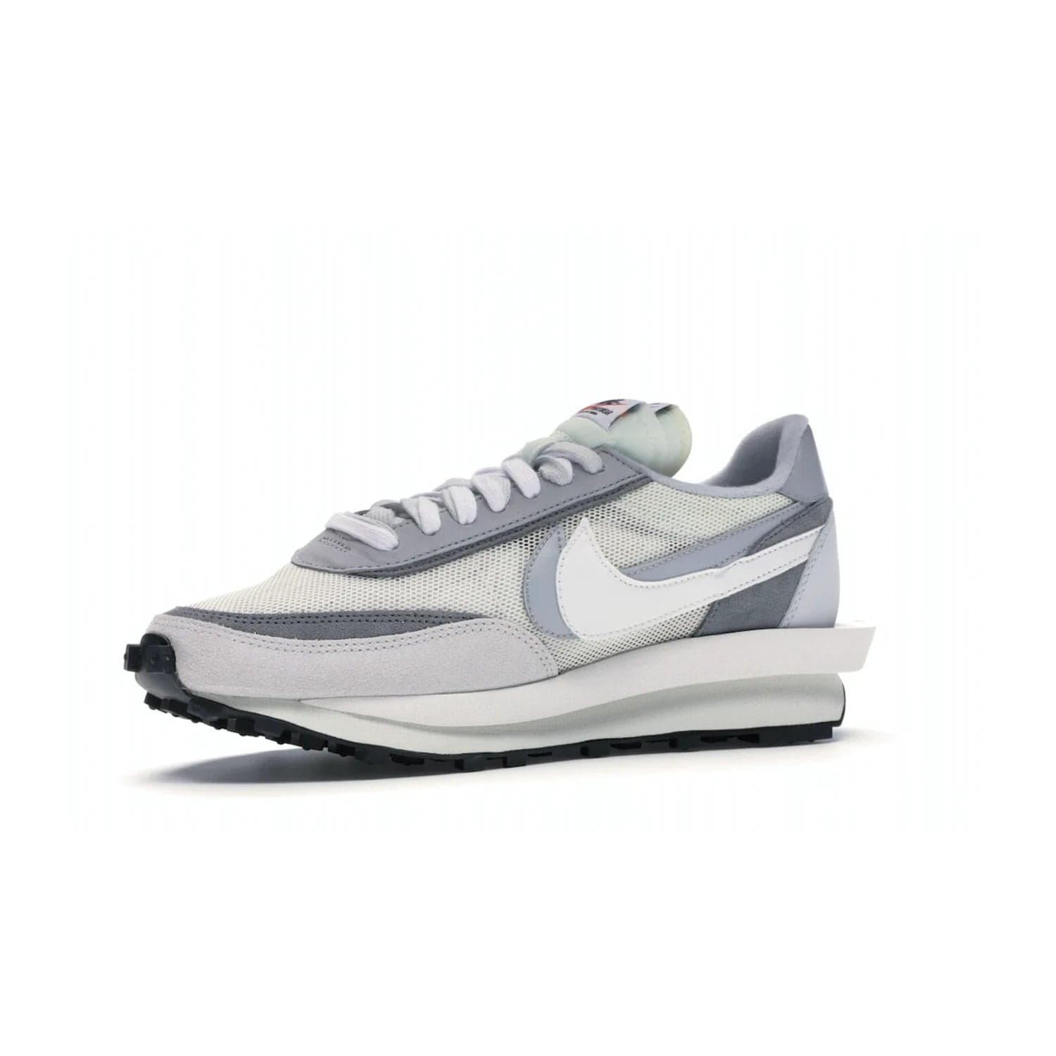 Nike LD Waffle sacai Summit White - Image 16 - Only at www.BallersClubKickz.com - Mesh fashion and comfort into your wardrobe with the Nike LD Waffle Sacai Summit White. Featuring a white upper, grey accents and overlapped white and grey Nike "Swoosh," these sneakers offer perfect balance of comfort and style. Perfect for office or a night out.