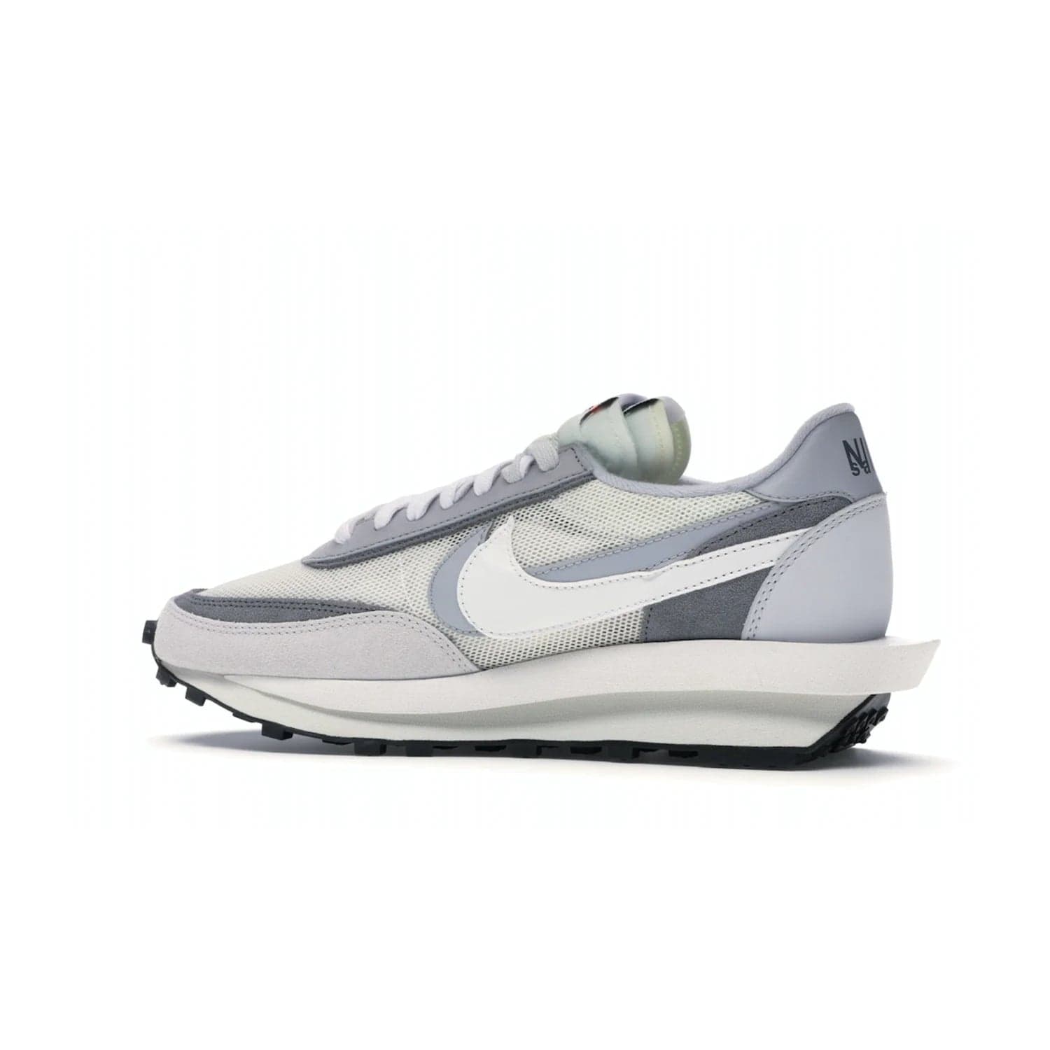 Nike LD Waffle sacai Summit White - Image 21 - Only at www.BallersClubKickz.com - Mesh fashion and comfort into your wardrobe with the Nike LD Waffle Sacai Summit White. Featuring a white upper, grey accents and overlapped white and grey Nike "Swoosh," these sneakers offer perfect balance of comfort and style. Perfect for office or a night out.
