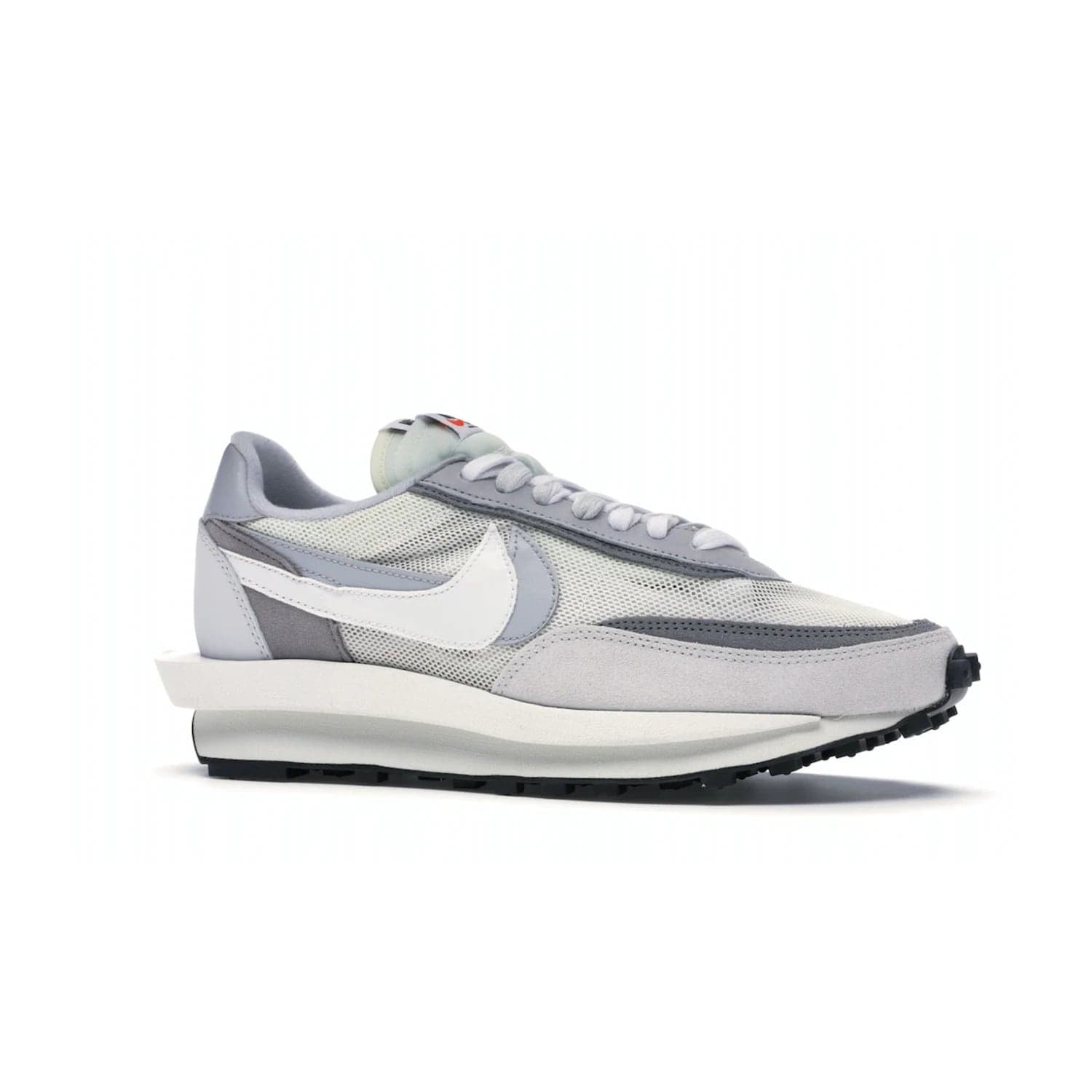 Nike LD Waffle sacai Summit White - Image 3 - Only at www.BallersClubKickz.com - Mesh fashion and comfort into your wardrobe with the Nike LD Waffle Sacai Summit White. Featuring a white upper, grey accents and overlapped white and grey Nike "Swoosh," these sneakers offer perfect balance of comfort and style. Perfect for office or a night out.