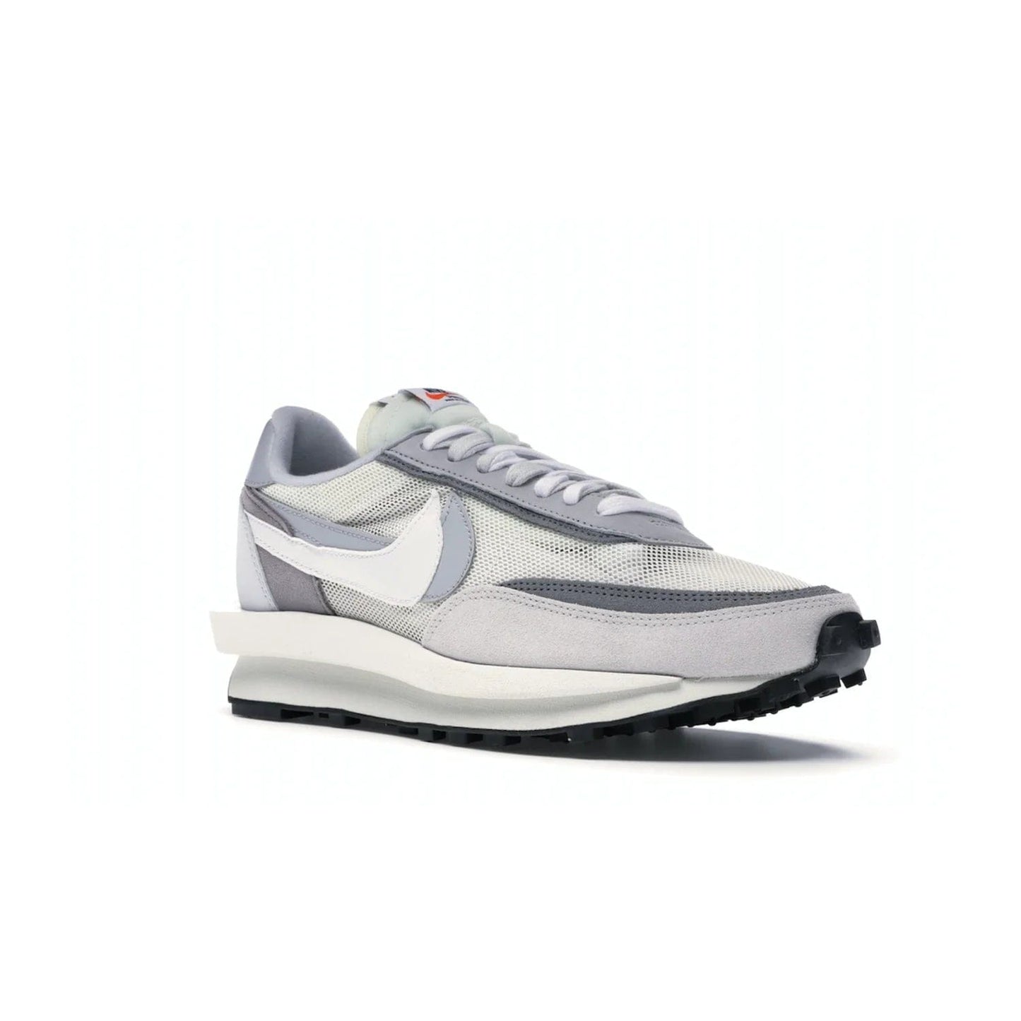 Nike LD Waffle sacai Summit White - Image 5 - Only at www.BallersClubKickz.com - Mesh fashion and comfort into your wardrobe with the Nike LD Waffle Sacai Summit White. Featuring a white upper, grey accents and overlapped white and grey Nike "Swoosh," these sneakers offer perfect balance of comfort and style. Perfect for office or a night out.