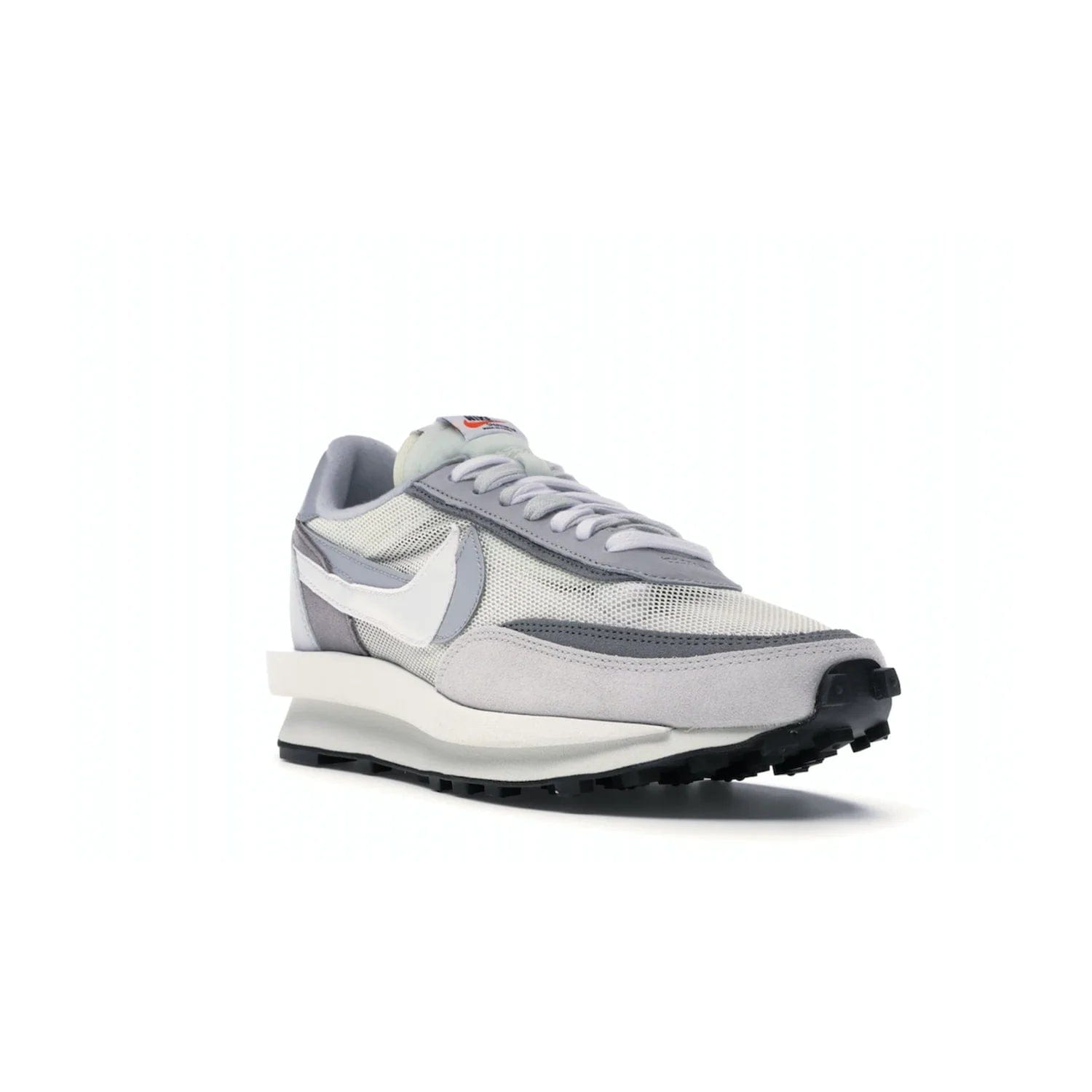 Nike LD Waffle sacai Summit White - Image 6 - Only at www.BallersClubKickz.com - Mesh fashion and comfort into your wardrobe with the Nike LD Waffle Sacai Summit White. Featuring a white upper, grey accents and overlapped white and grey Nike "Swoosh," these sneakers offer perfect balance of comfort and style. Perfect for office or a night out.