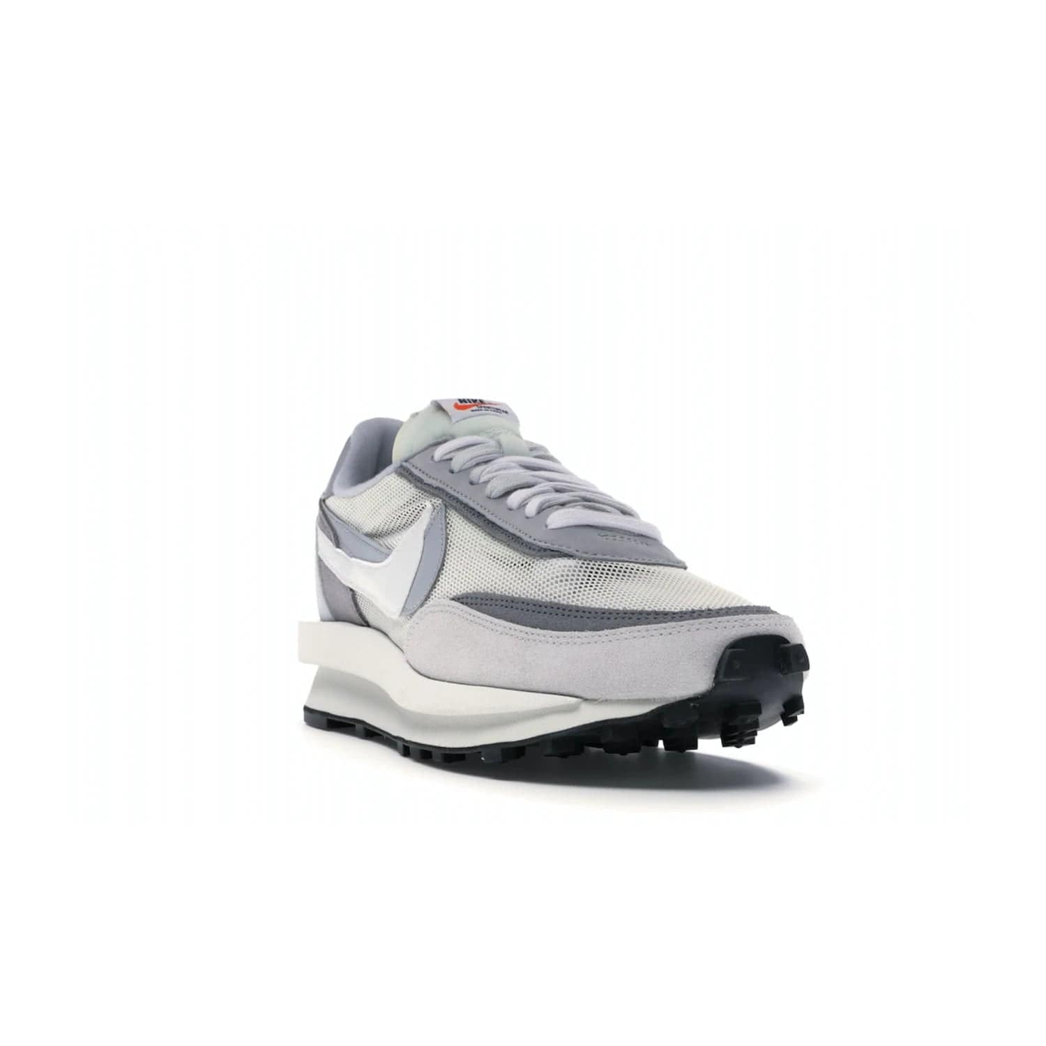 Nike LD Waffle sacai Summit White - Image 7 - Only at www.BallersClubKickz.com - Mesh fashion and comfort into your wardrobe with the Nike LD Waffle Sacai Summit White. Featuring a white upper, grey accents and overlapped white and grey Nike "Swoosh," these sneakers offer perfect balance of comfort and style. Perfect for office or a night out.