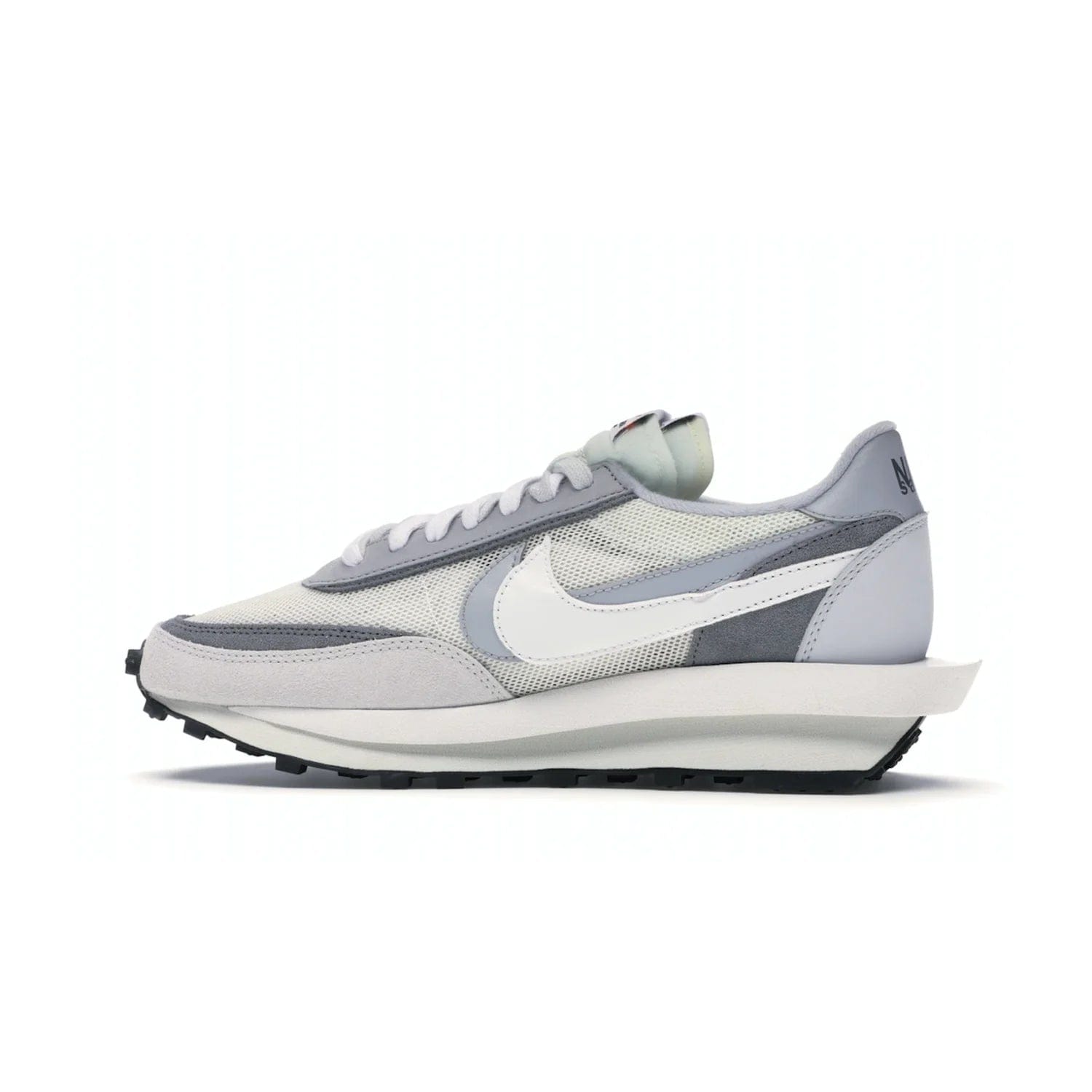 Nike LD Waffle sacai Summit White - Image 20 - Only at www.BallersClubKickz.com - Mesh fashion and comfort into your wardrobe with the Nike LD Waffle Sacai Summit White. Featuring a white upper, grey accents and overlapped white and grey Nike "Swoosh," these sneakers offer perfect balance of comfort and style. Perfect for office or a night out.