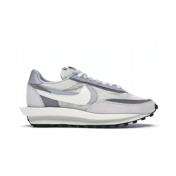 Nike LD Waffle sacai Summit White - Image 1 - Only at www.BallersClubKickz.com - Mesh fashion and comfort into your wardrobe with the Nike LD Waffle Sacai Summit White. Featuring a white upper, grey accents and overlapped white and grey Nike "Swoosh," these sneakers offer perfect balance of comfort and style. Perfect for office or a night out.