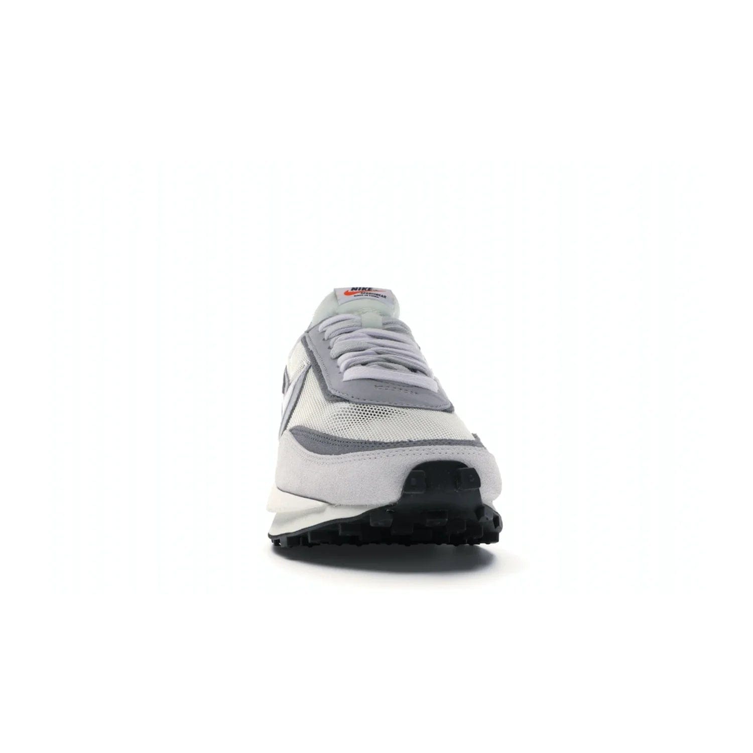 Nike LD Waffle sacai Summit White - Image 9 - Only at www.BallersClubKickz.com - Mesh fashion and comfort into your wardrobe with the Nike LD Waffle Sacai Summit White. Featuring a white upper, grey accents and overlapped white and grey Nike "Swoosh," these sneakers offer perfect balance of comfort and style. Perfect for office or a night out.