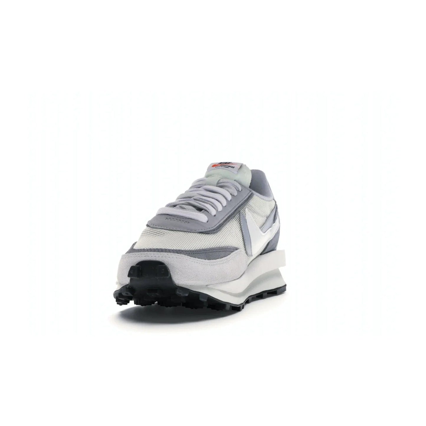 Nike LD Waffle sacai Summit White - Image 12 - Only at www.BallersClubKickz.com - Mesh fashion and comfort into your wardrobe with the Nike LD Waffle Sacai Summit White. Featuring a white upper, grey accents and overlapped white and grey Nike "Swoosh," these sneakers offer perfect balance of comfort and style. Perfect for office or a night out.