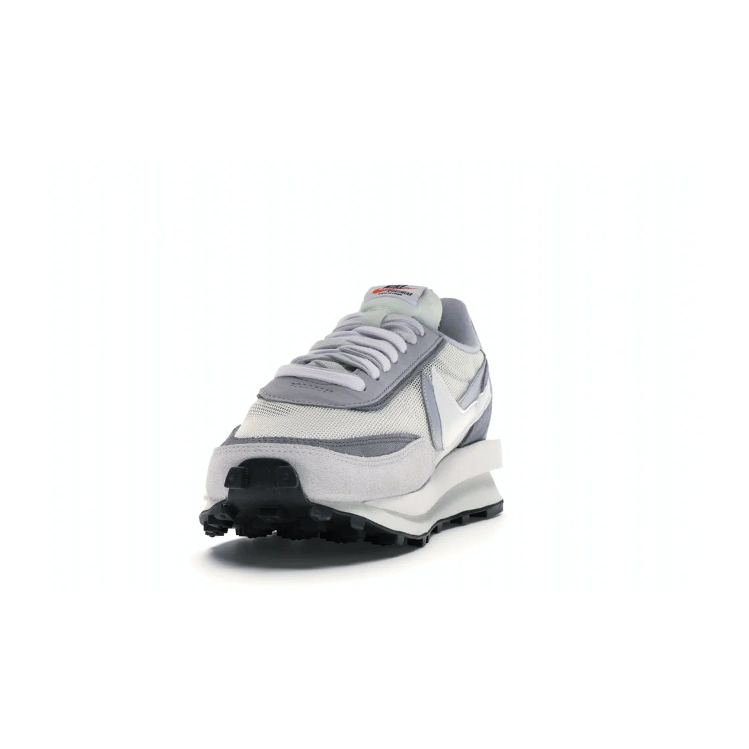 Nike LD Waffle sacai Summit White - Image 12 - Only at www.BallersClubKickz.com - Mesh fashion and comfort into your wardrobe with the Nike LD Waffle Sacai Summit White. Featuring a white upper, grey accents and overlapped white and grey Nike "Swoosh," these sneakers offer perfect balance of comfort and style. Perfect for office or a night out.