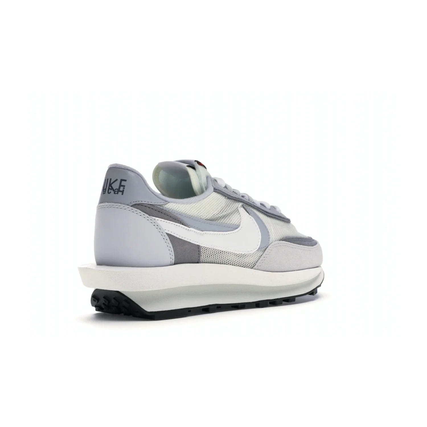 Nike LD Waffle sacai Summit White - Image 32 - Only at www.BallersClubKickz.com - Mesh fashion and comfort into your wardrobe with the Nike LD Waffle Sacai Summit White. Featuring a white upper, grey accents and overlapped white and grey Nike "Swoosh," these sneakers offer perfect balance of comfort and style. Perfect for office or a night out.