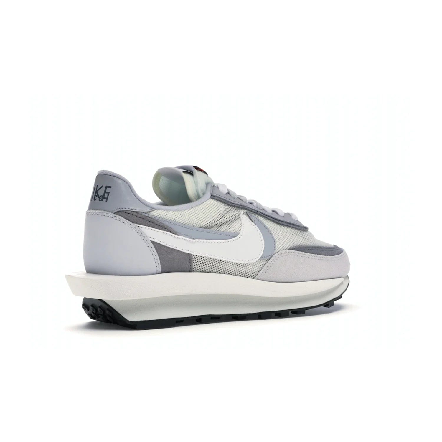 Nike LD Waffle sacai Summit White - Image 33 - Only at www.BallersClubKickz.com - Mesh fashion and comfort into your wardrobe with the Nike LD Waffle Sacai Summit White. Featuring a white upper, grey accents and overlapped white and grey Nike "Swoosh," these sneakers offer perfect balance of comfort and style. Perfect for office or a night out.
