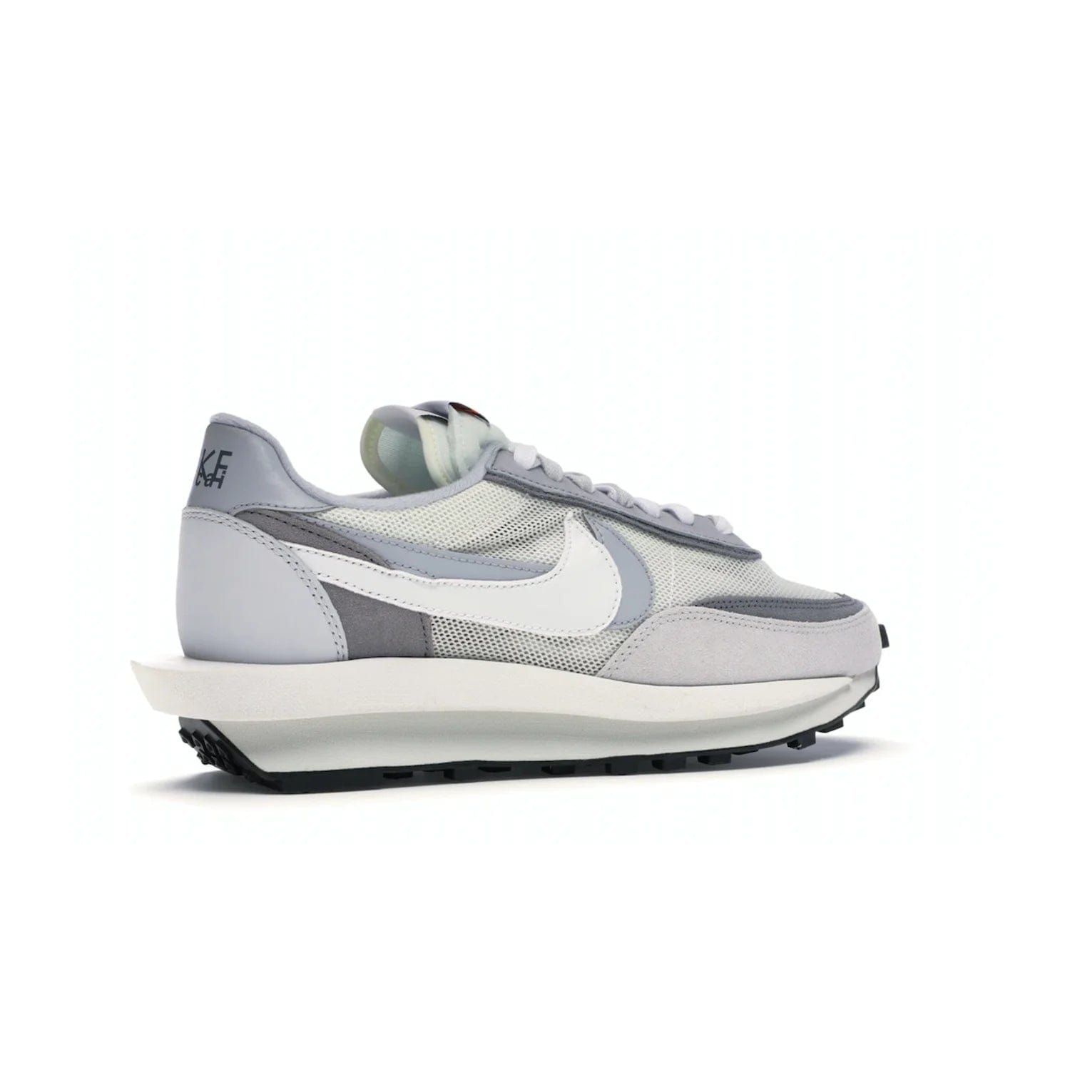 Nike LD Waffle sacai Summit White - Image 34 - Only at www.BallersClubKickz.com - Mesh fashion and comfort into your wardrobe with the Nike LD Waffle Sacai Summit White. Featuring a white upper, grey accents and overlapped white and grey Nike "Swoosh," these sneakers offer perfect balance of comfort and style. Perfect for office or a night out.