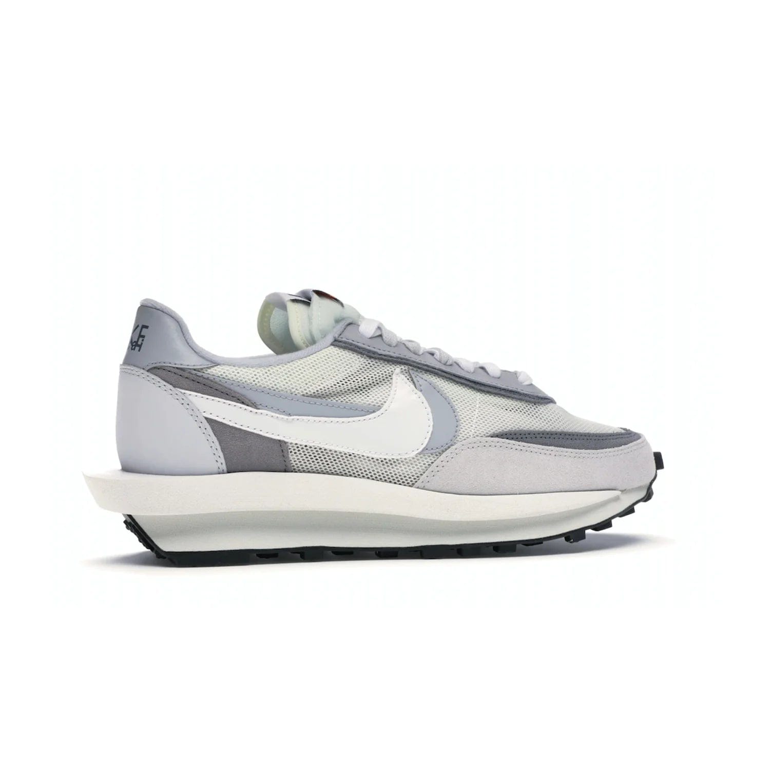 Nike LD Waffle sacai Summit White - Image 35 - Only at www.BallersClubKickz.com - Mesh fashion and comfort into your wardrobe with the Nike LD Waffle Sacai Summit White. Featuring a white upper, grey accents and overlapped white and grey Nike "Swoosh," these sneakers offer perfect balance of comfort and style. Perfect for office or a night out.