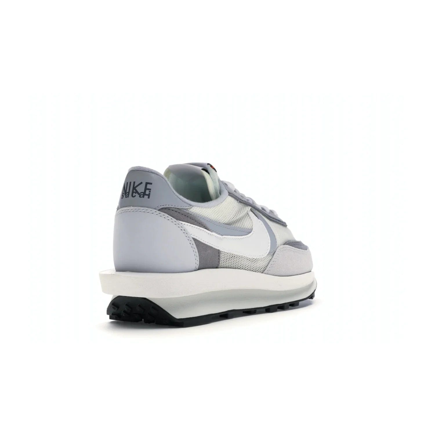 Nike LD Waffle sacai Summit White - Image 31 - Only at www.BallersClubKickz.com - Mesh fashion and comfort into your wardrobe with the Nike LD Waffle Sacai Summit White. Featuring a white upper, grey accents and overlapped white and grey Nike "Swoosh," these sneakers offer perfect balance of comfort and style. Perfect for office or a night out.