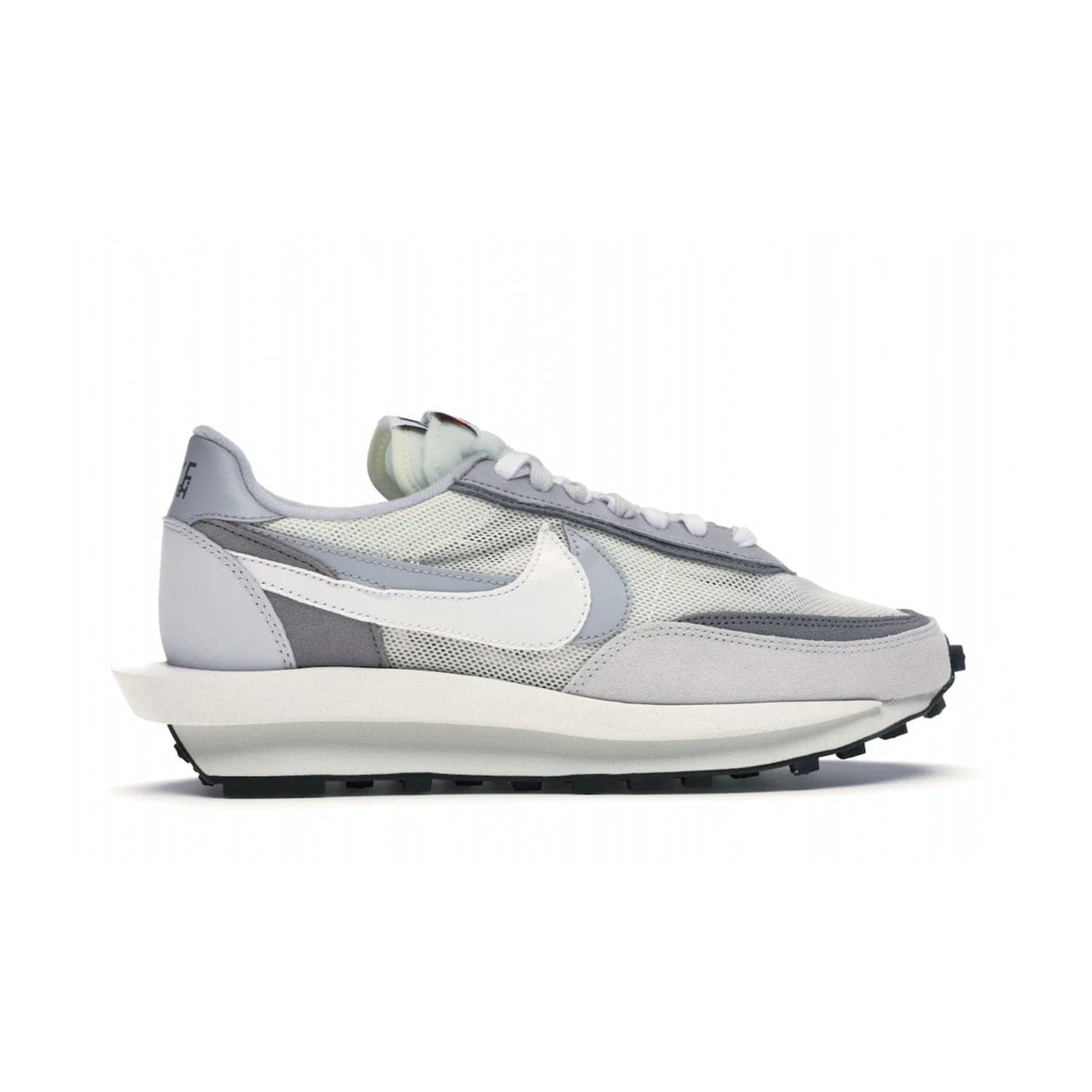 Nike LD Waffle sacai Summit White - Image 36 - Only at www.BallersClubKickz.com - Mesh fashion and comfort into your wardrobe with the Nike LD Waffle Sacai Summit White. Featuring a white upper, grey accents and overlapped white and grey Nike "Swoosh," these sneakers offer perfect balance of comfort and style. Perfect for office or a night out.