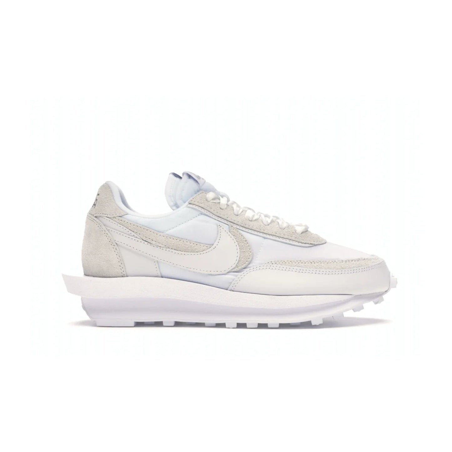 Nike LD Waffle sacai White Nylon - Image 1 - Only at www.BallersClubKickz.com - A classic, timeless design with a white nylon upper and subtle grey suede overlays. This recent Nike LD Waffle Sacai White Nylon design requires only one pair of laces to complete the perfect look for smart and casual styles.