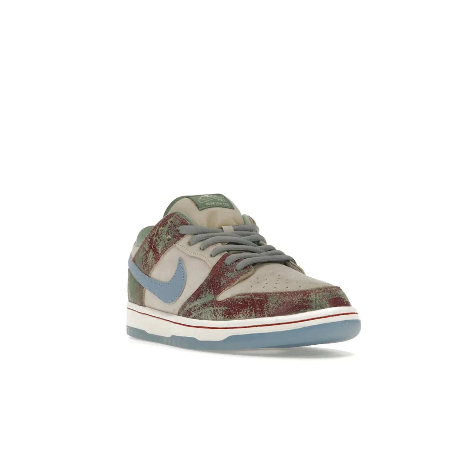 Nike SB Dunk Low Crenshaw Skate Club - Image 7 - Only at www.BallersClubKickz.com - Introducing the Nike SB Dunk Low Crenshaw Skate Club! Classic skate shoes with Sail and Light Blue upper, Cedar accents, padded collars and superior grip for comfortable, stable performance and style. Ideal for any skate session.