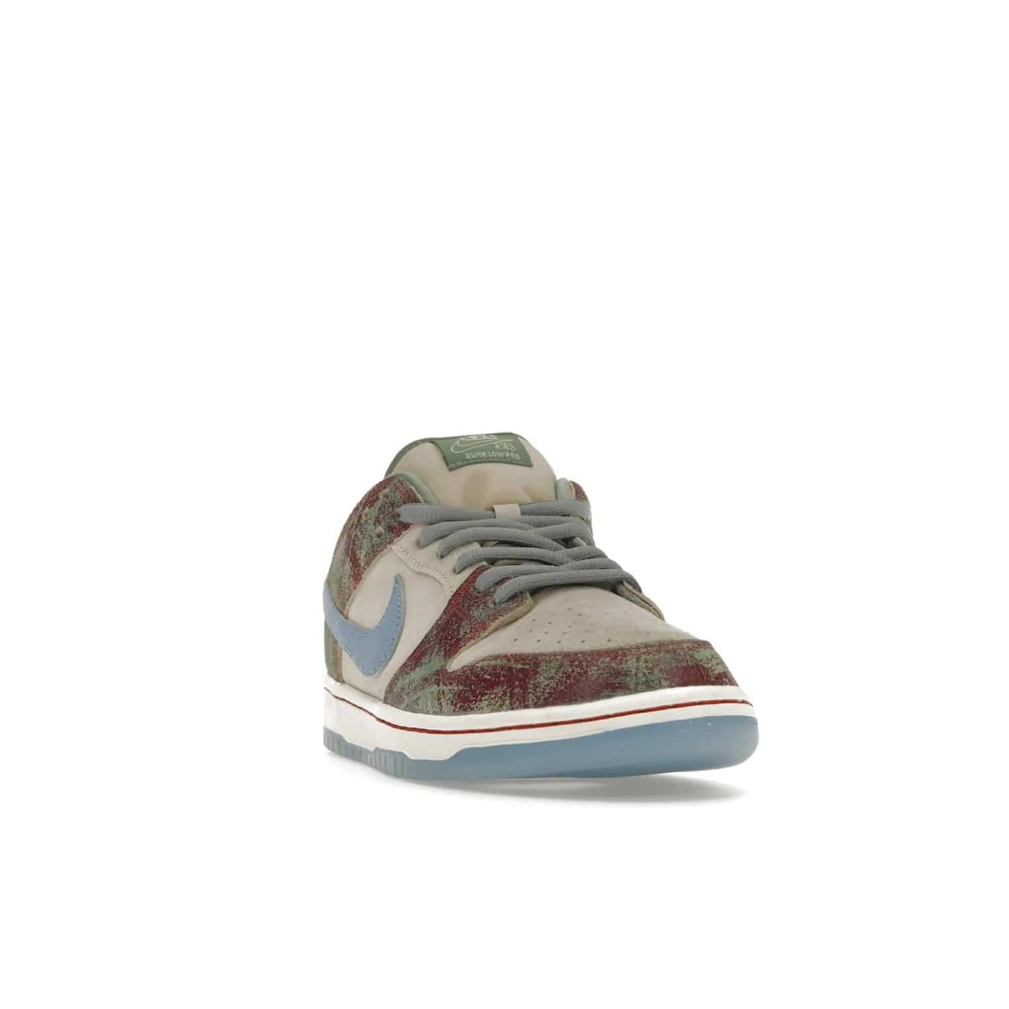 Nike SB Dunk Low Crenshaw Skate Club - Image 8 - Only at www.BallersClubKickz.com - Introducing the Nike SB Dunk Low Crenshaw Skate Club! Classic skate shoes with Sail and Light Blue upper, Cedar accents, padded collars and superior grip for comfortable, stable performance and style. Ideal for any skate session.