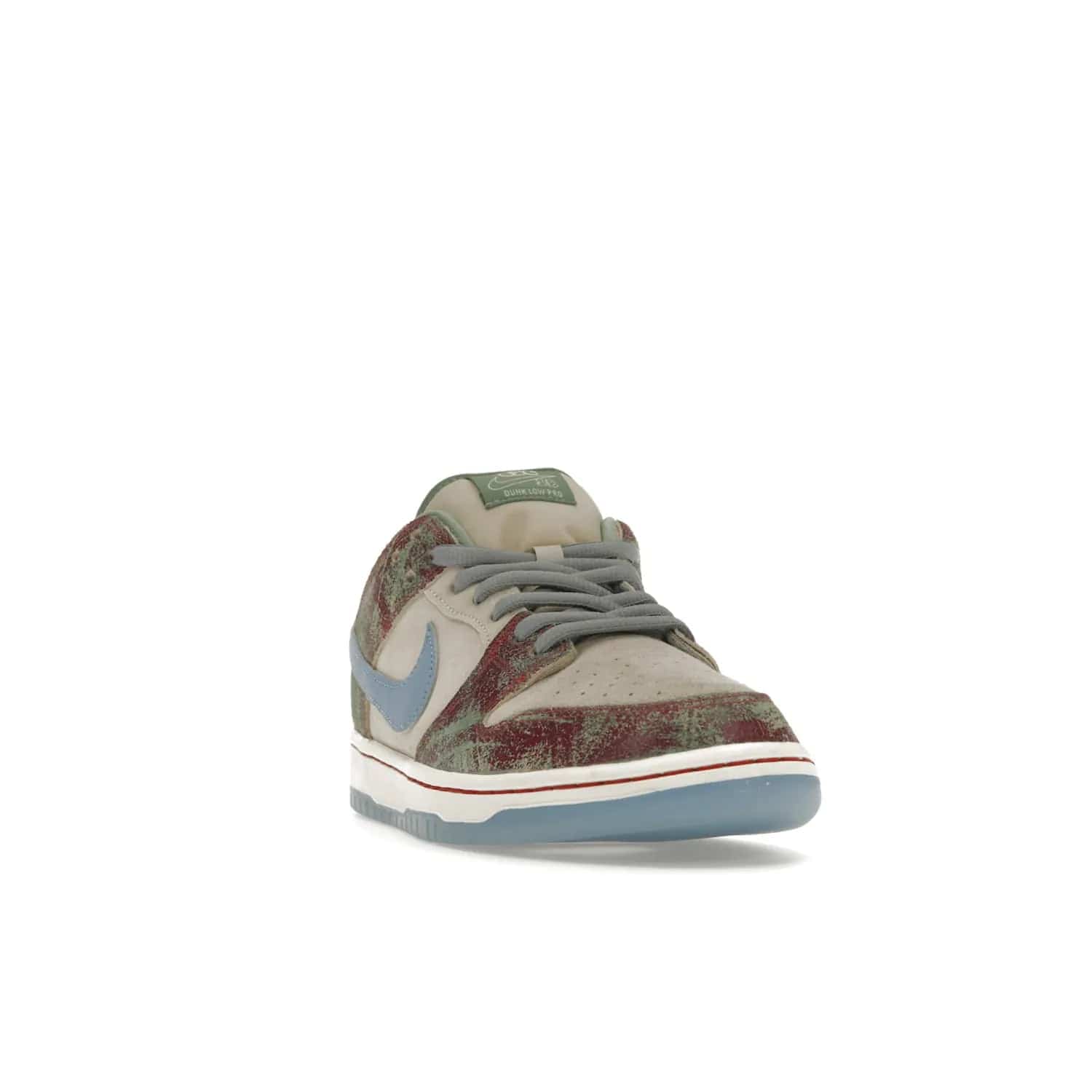 Nike SB Dunk Low Crenshaw Skate Club - Image 8 - Only at www.BallersClubKickz.com - Introducing the Nike SB Dunk Low Crenshaw Skate Club! Classic skate shoes with Sail and Light Blue upper, Cedar accents, padded collars and superior grip for comfortable, stable performance and style. Ideal for any skate session.
