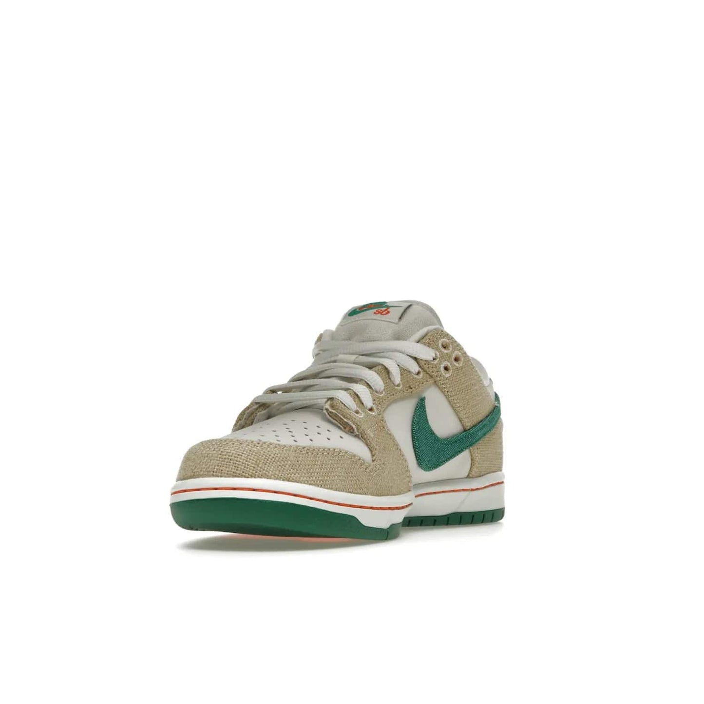 Nike SB Dunk Low Jarritos - Image 13 - Only at www.BallersClubKickz.com - Shop limited edition Nike SB Dunk Low Jarritos! Crafted with white leather and tear-away canvas materials with green accents. Includes orange, green, and white laces to customize your look. Available now.