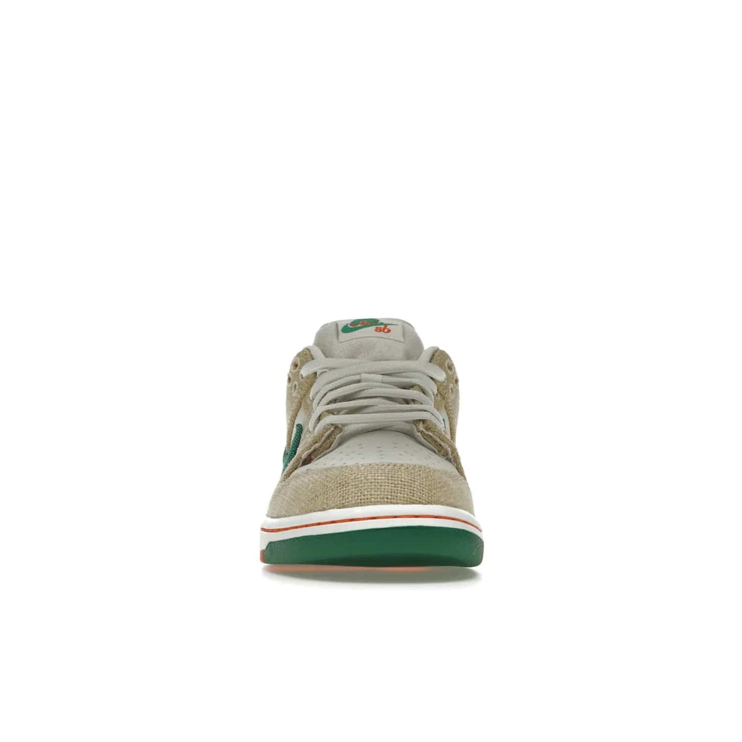 Nike SB Dunk Low Jarritos - Image 10 - Only at www.BallersClubKickz.com - Shop limited edition Nike SB Dunk Low Jarritos! Crafted with white leather and tear-away canvas materials with green accents. Includes orange, green, and white laces to customize your look. Available now.