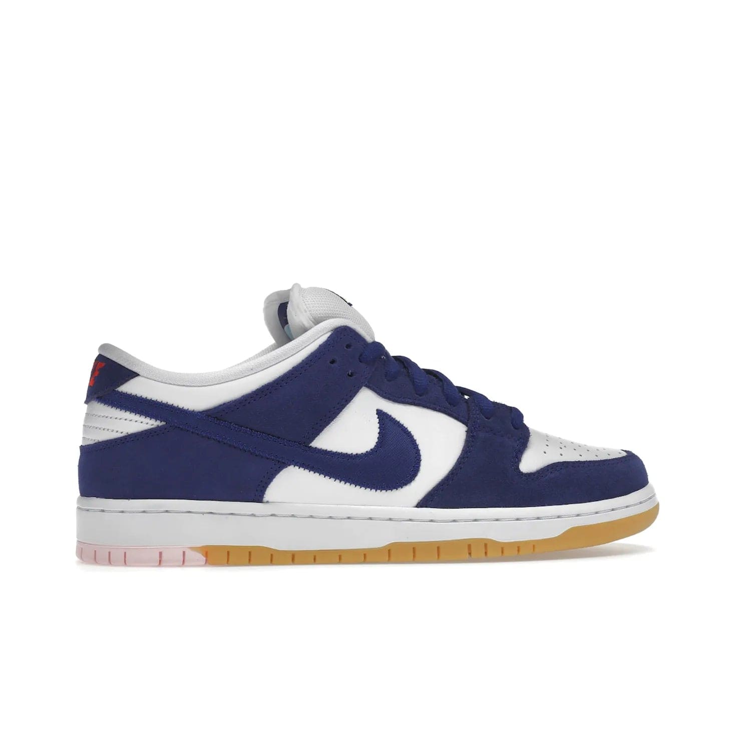 Nike SB Dunk Low Los Angeles Dodgers - Image 36 - Only at www.BallersClubKickz.com - Make a statement with the limited edition Nike SB Dunk Low Los Angeles Dodgers. Featuring a striking blue and white color combination, convenient lace-up closure, light-brown sole, and pink graphic, this stylish and comfortable low-top sneaker is perfect for sport fans and sneaker enthusiasts alike. Available in June 2022.
