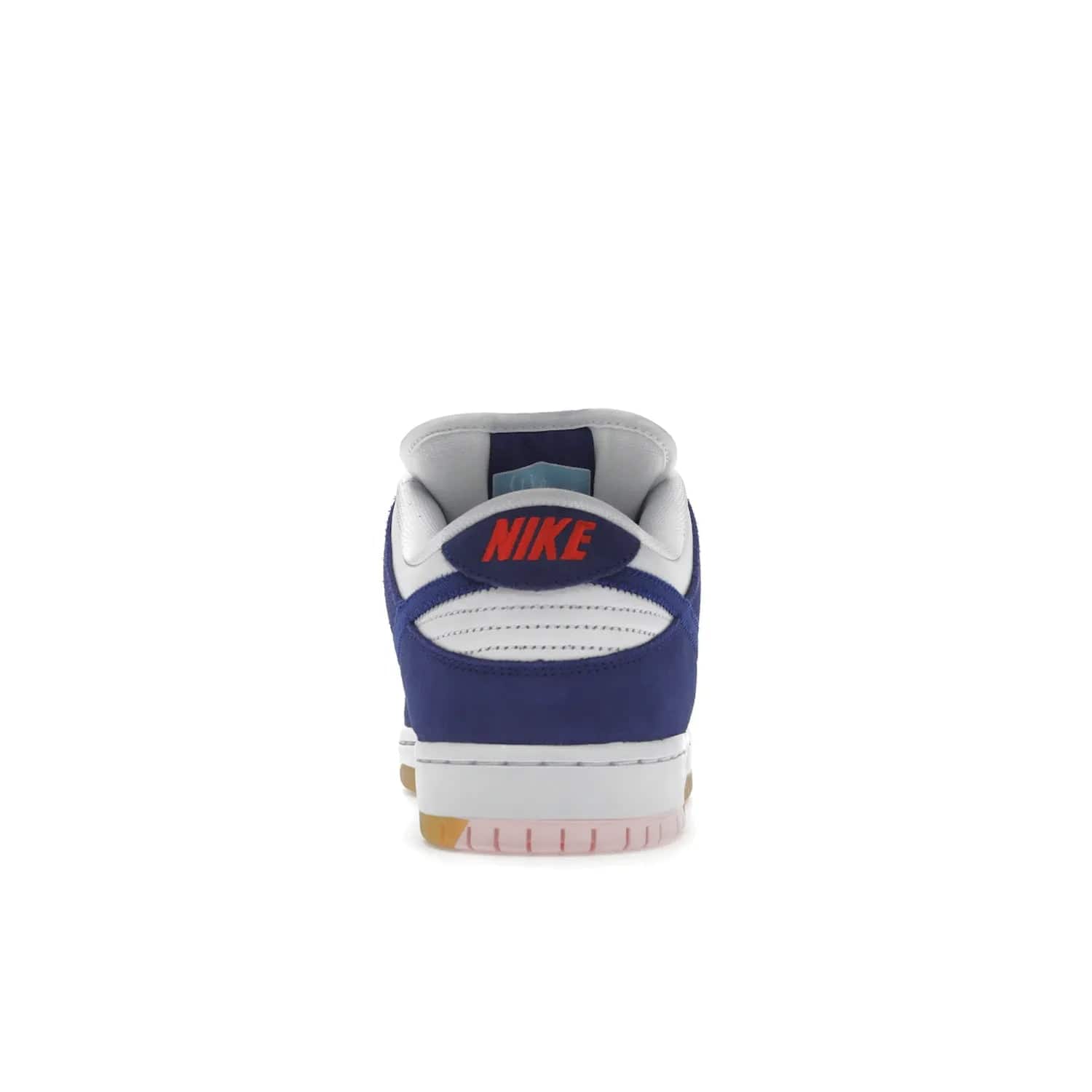 Nike SB Dunk Low Los Angeles Dodgers - Image 28 - Only at www.BallersClubKickz.com - Make a statement with the limited edition Nike SB Dunk Low Los Angeles Dodgers. Featuring a striking blue and white color combination, convenient lace-up closure, light-brown sole, and pink graphic, this stylish and comfortable low-top sneaker is perfect for sport fans and sneaker enthusiasts alike. Available in June 2022.