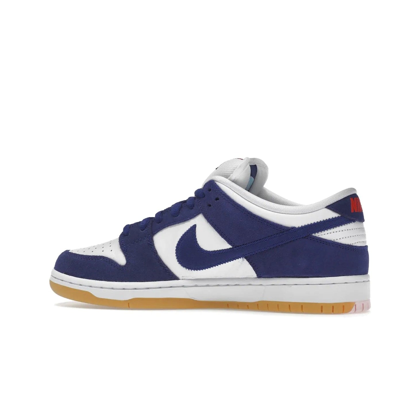 Nike SB Dunk Low Los Angeles Dodgers - Image 21 - Only at www.BallersClubKickz.com - Make a statement with the limited edition Nike SB Dunk Low Los Angeles Dodgers. Featuring a striking blue and white color combination, convenient lace-up closure, light-brown sole, and pink graphic, this stylish and comfortable low-top sneaker is perfect for sport fans and sneaker enthusiasts alike. Available in June 2022.