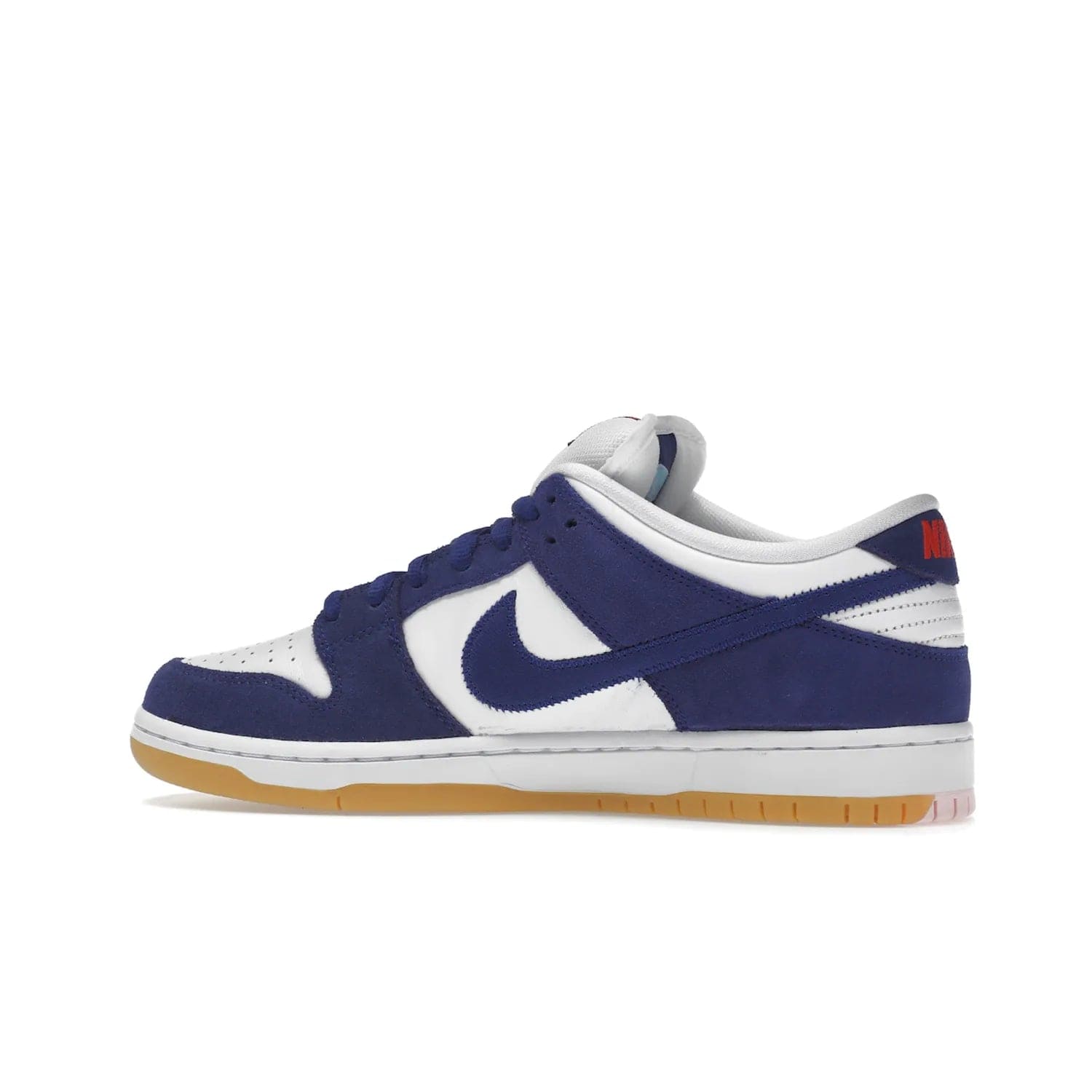 Nike SB Dunk Low Los Angeles Dodgers - Image 21 - Only at www.BallersClubKickz.com - Make a statement with the limited edition Nike SB Dunk Low Los Angeles Dodgers. Featuring a striking blue and white color combination, convenient lace-up closure, light-brown sole, and pink graphic, this stylish and comfortable low-top sneaker is perfect for sport fans and sneaker enthusiasts alike. Available in June 2022.
