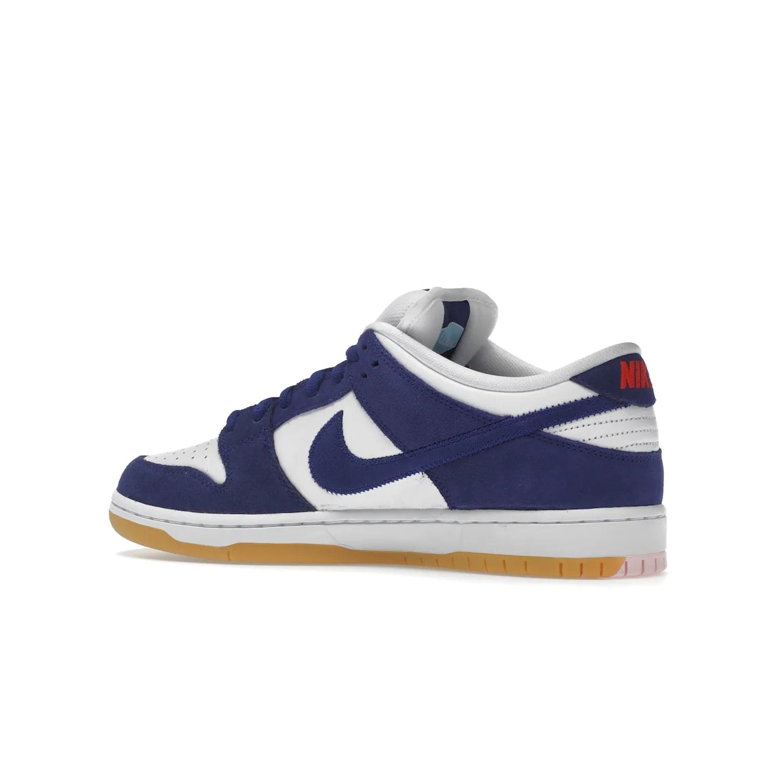 Nike SB Dunk Low Los Angeles Dodgers - Image 22 - Only at www.BallersClubKickz.com - Make a statement with the limited edition Nike SB Dunk Low Los Angeles Dodgers. Featuring a striking blue and white color combination, convenient lace-up closure, light-brown sole, and pink graphic, this stylish and comfortable low-top sneaker is perfect for sport fans and sneaker enthusiasts alike. Available in June 2022.
