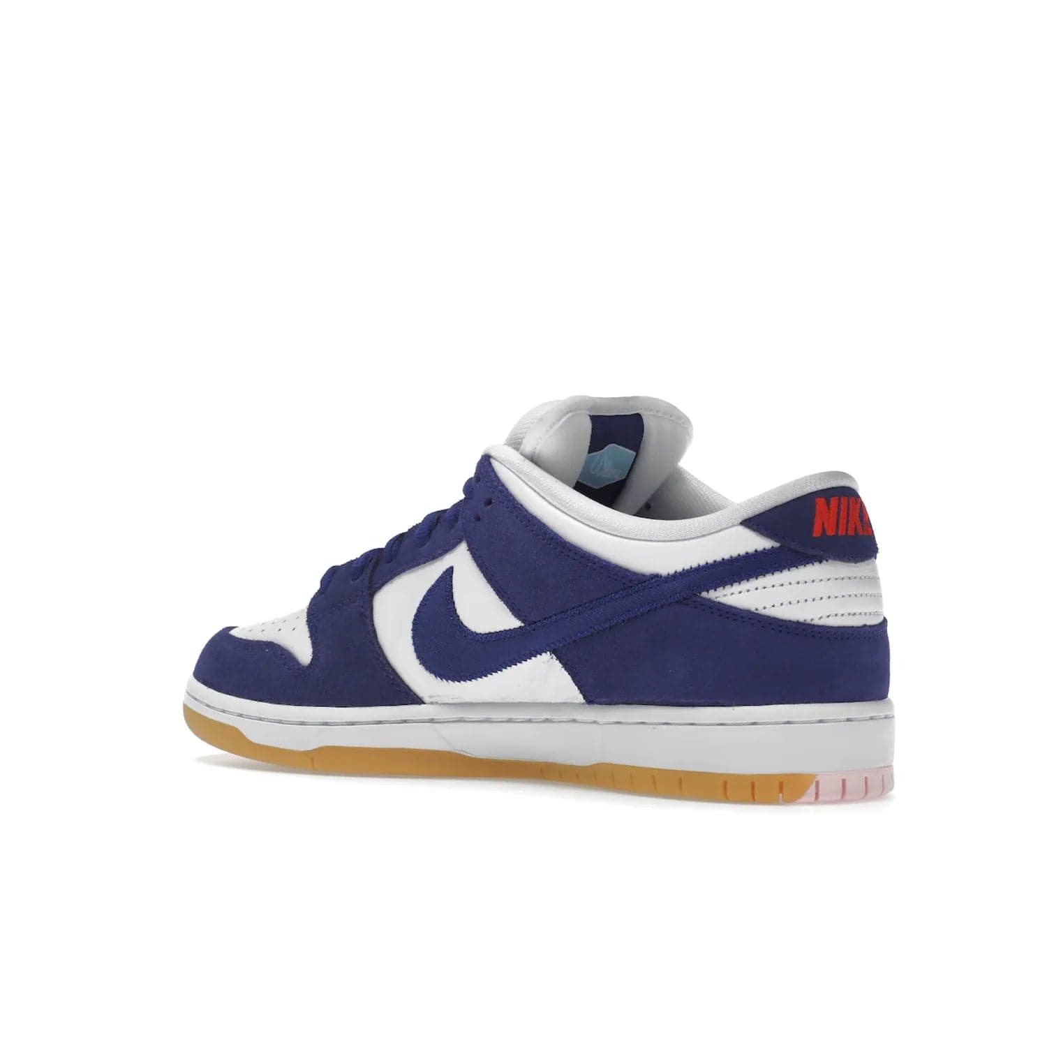 Nike SB Dunk Low Los Angeles Dodgers - Image 23 - Only at www.BallersClubKickz.com - Make a statement with the limited edition Nike SB Dunk Low Los Angeles Dodgers. Featuring a striking blue and white color combination, convenient lace-up closure, light-brown sole, and pink graphic, this stylish and comfortable low-top sneaker is perfect for sport fans and sneaker enthusiasts alike. Available in June 2022.