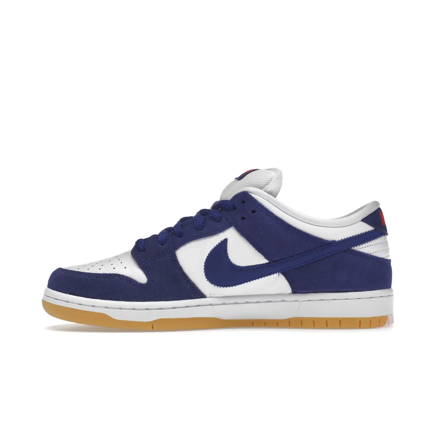 Nike SB Dunk Low Los Angeles Dodgers - Image 19 - Only at www.BallersClubKickz.com - Make a statement with the limited edition Nike SB Dunk Low Los Angeles Dodgers. Featuring a striking blue and white color combination, convenient lace-up closure, light-brown sole, and pink graphic, this stylish and comfortable low-top sneaker is perfect for sport fans and sneaker enthusiasts alike. Available in June 2022.