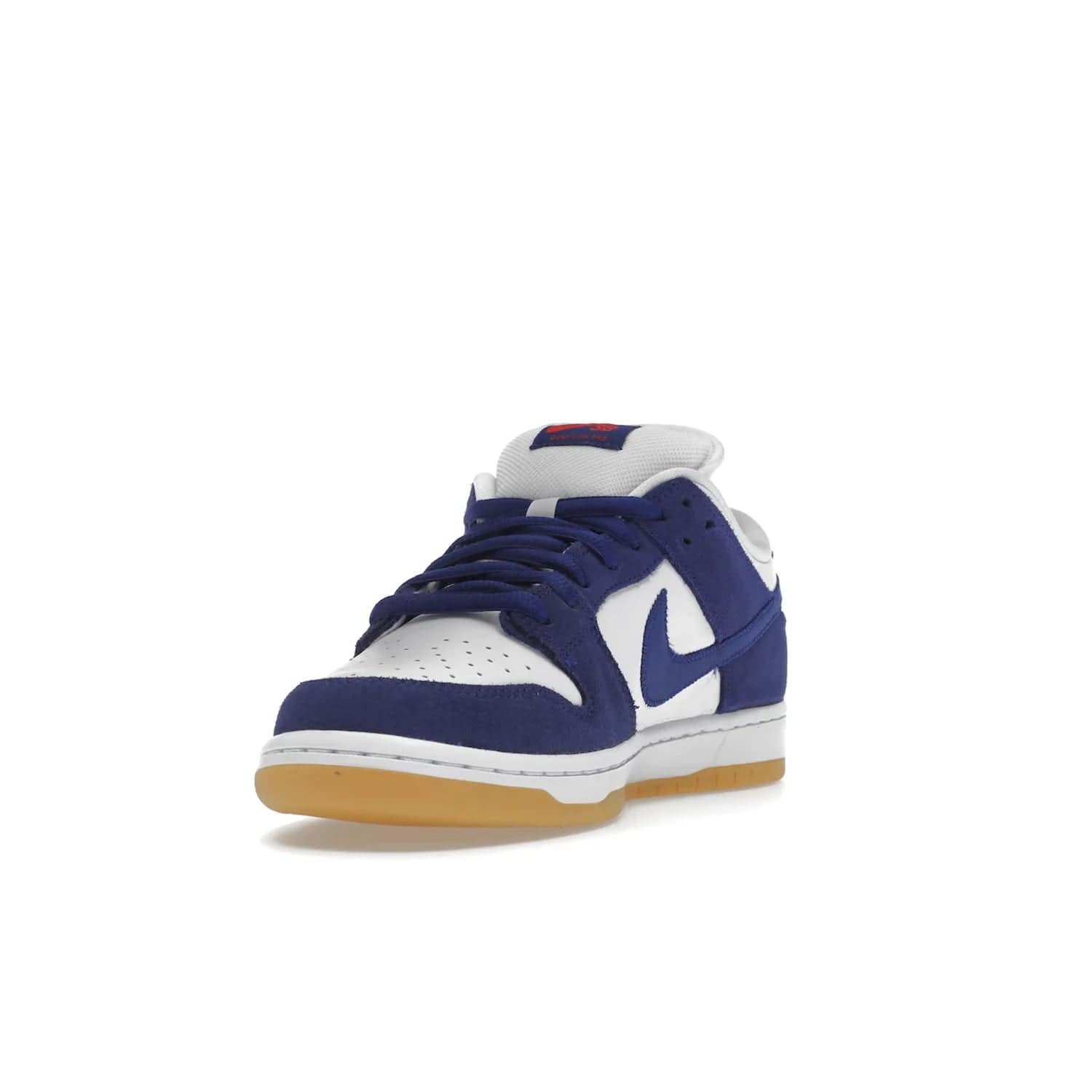 Nike SB Dunk Low Los Angeles Dodgers - Image 13 - Only at www.BallersClubKickz.com - Make a statement with the limited edition Nike SB Dunk Low Los Angeles Dodgers. Featuring a striking blue and white color combination, convenient lace-up closure, light-brown sole, and pink graphic, this stylish and comfortable low-top sneaker is perfect for sport fans and sneaker enthusiasts alike. Available in June 2022.