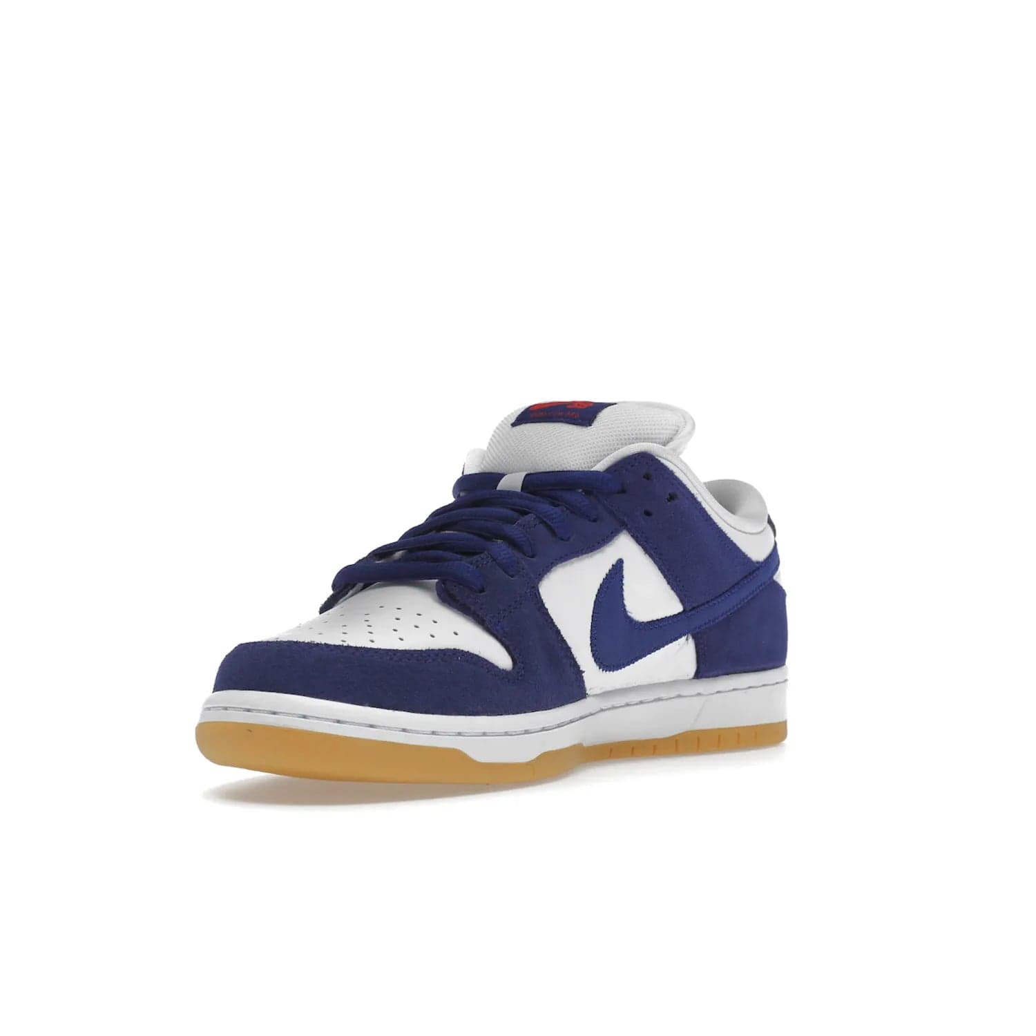 Nike SB Dunk Low Los Angeles Dodgers - Image 14 - Only at www.BallersClubKickz.com - Make a statement with the limited edition Nike SB Dunk Low Los Angeles Dodgers. Featuring a striking blue and white color combination, convenient lace-up closure, light-brown sole, and pink graphic, this stylish and comfortable low-top sneaker is perfect for sport fans and sneaker enthusiasts alike. Available in June 2022.