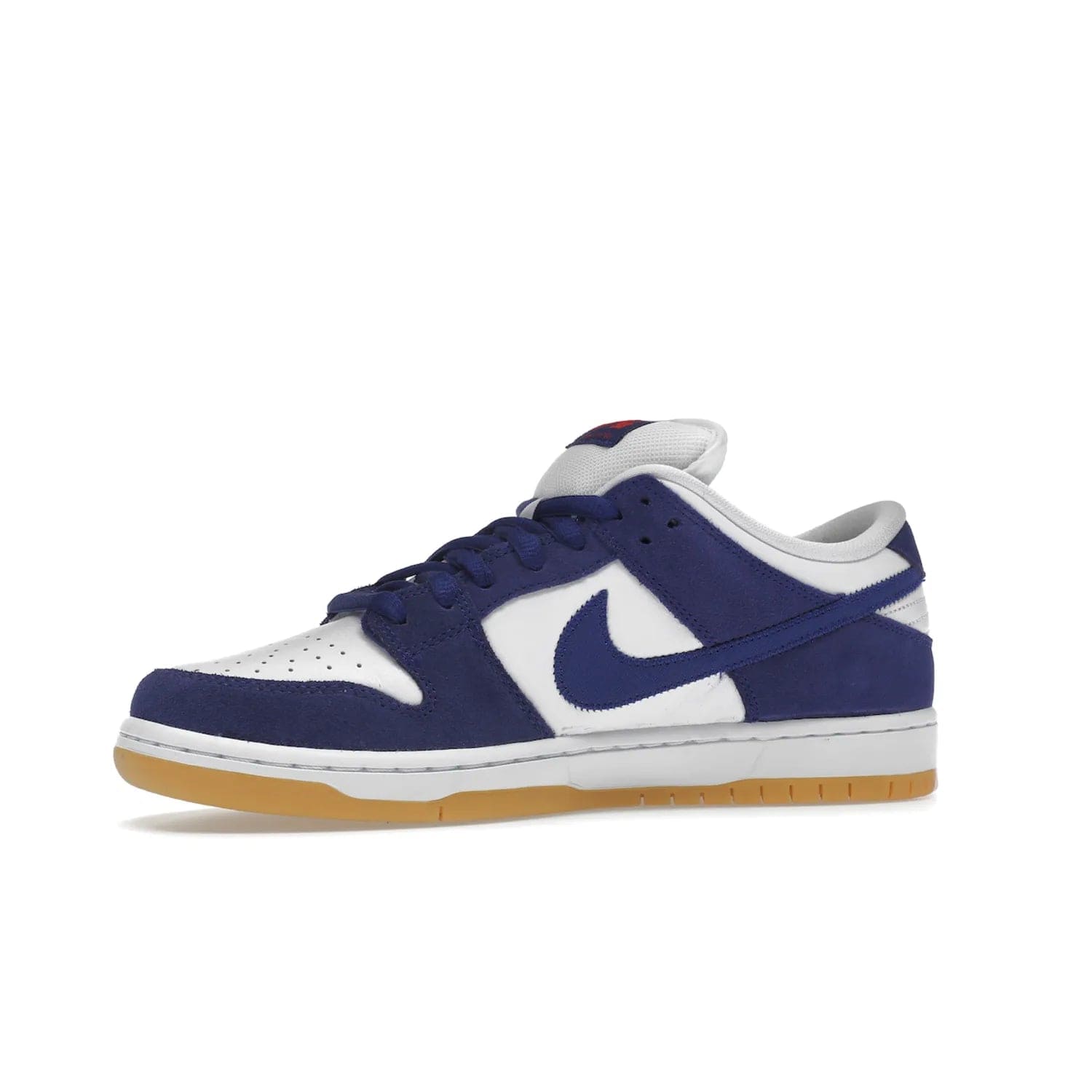 Nike SB Dunk Low Los Angeles Dodgers - Image 17 - Only at www.BallersClubKickz.com - Make a statement with the limited edition Nike SB Dunk Low Los Angeles Dodgers. Featuring a striking blue and white color combination, convenient lace-up closure, light-brown sole, and pink graphic, this stylish and comfortable low-top sneaker is perfect for sport fans and sneaker enthusiasts alike. Available in June 2022.