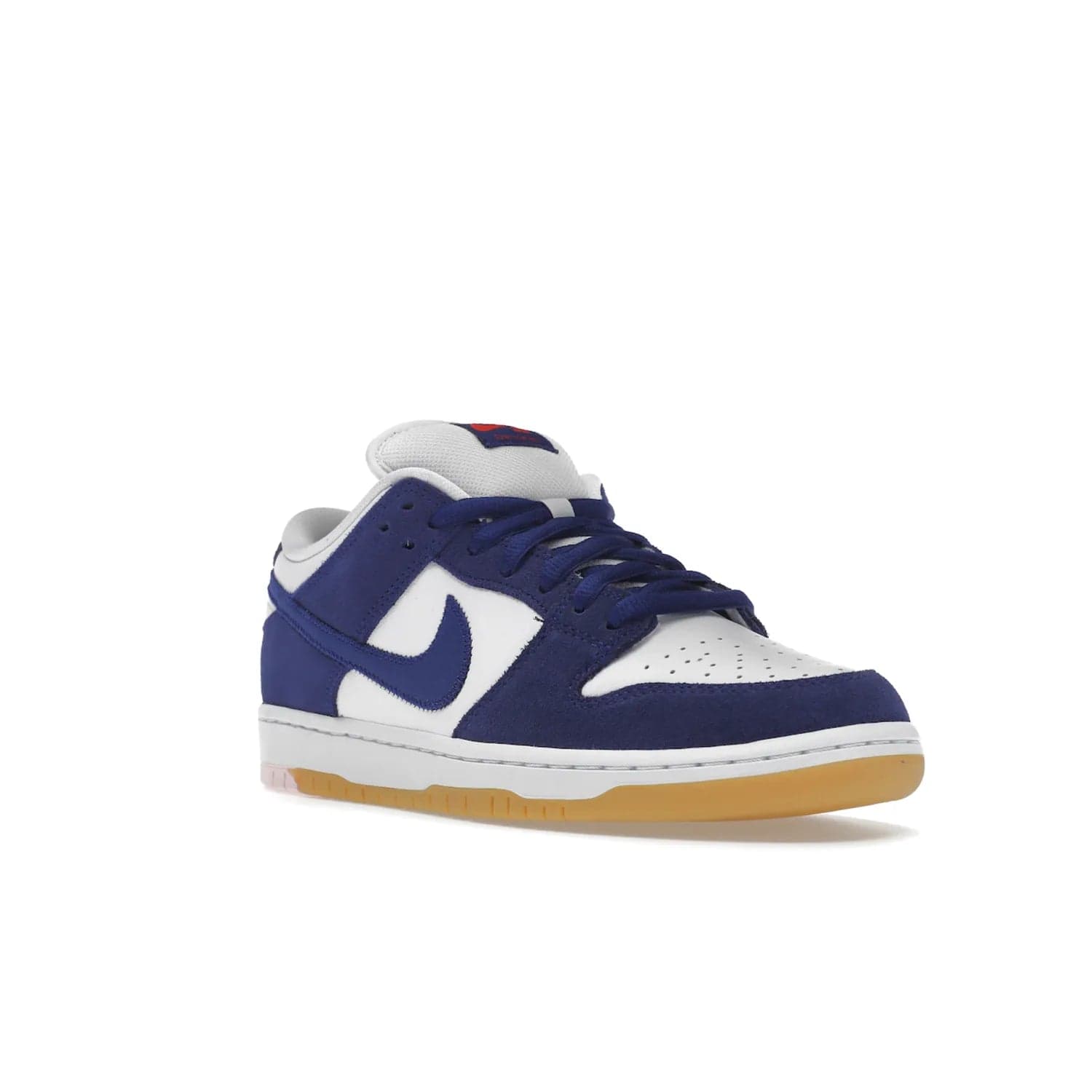 Nike SB Dunk Low Los Angeles Dodgers - Image 6 - Only at www.BallersClubKickz.com - Make a statement with the limited edition Nike SB Dunk Low Los Angeles Dodgers. Featuring a striking blue and white color combination, convenient lace-up closure, light-brown sole, and pink graphic, this stylish and comfortable low-top sneaker is perfect for sport fans and sneaker enthusiasts alike. Available in June 2022.