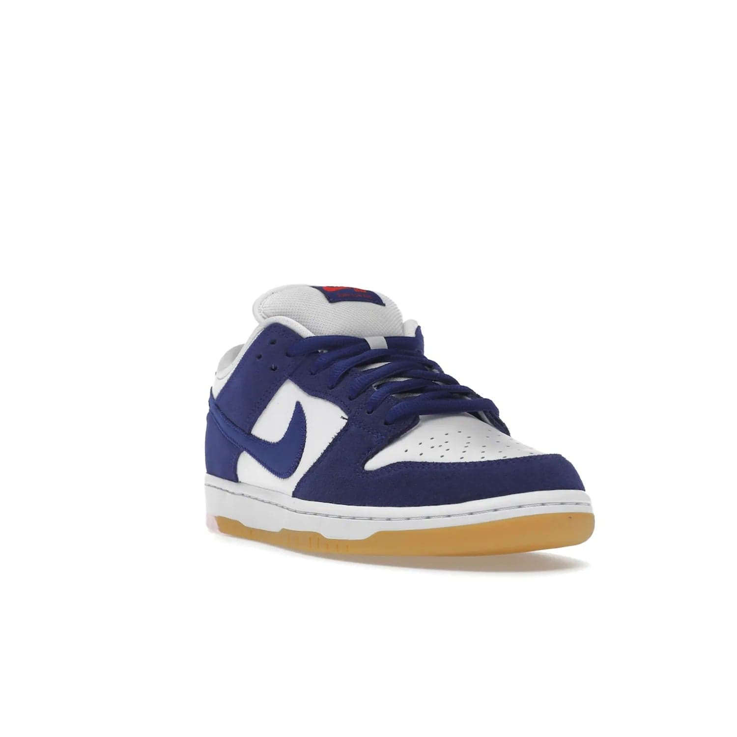 Nike SB Dunk Low Los Angeles Dodgers - Image 7 - Only at www.BallersClubKickz.com - Make a statement with the limited edition Nike SB Dunk Low Los Angeles Dodgers. Featuring a striking blue and white color combination, convenient lace-up closure, light-brown sole, and pink graphic, this stylish and comfortable low-top sneaker is perfect for sport fans and sneaker enthusiasts alike. Available in June 2022.