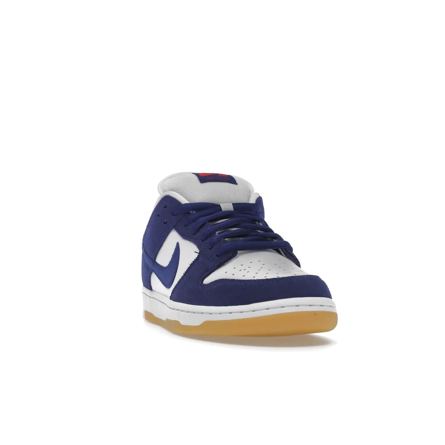Nike SB Dunk Low Los Angeles Dodgers - Image 8 - Only at www.BallersClubKickz.com - Make a statement with the limited edition Nike SB Dunk Low Los Angeles Dodgers. Featuring a striking blue and white color combination, convenient lace-up closure, light-brown sole, and pink graphic, this stylish and comfortable low-top sneaker is perfect for sport fans and sneaker enthusiasts alike. Available in June 2022.
