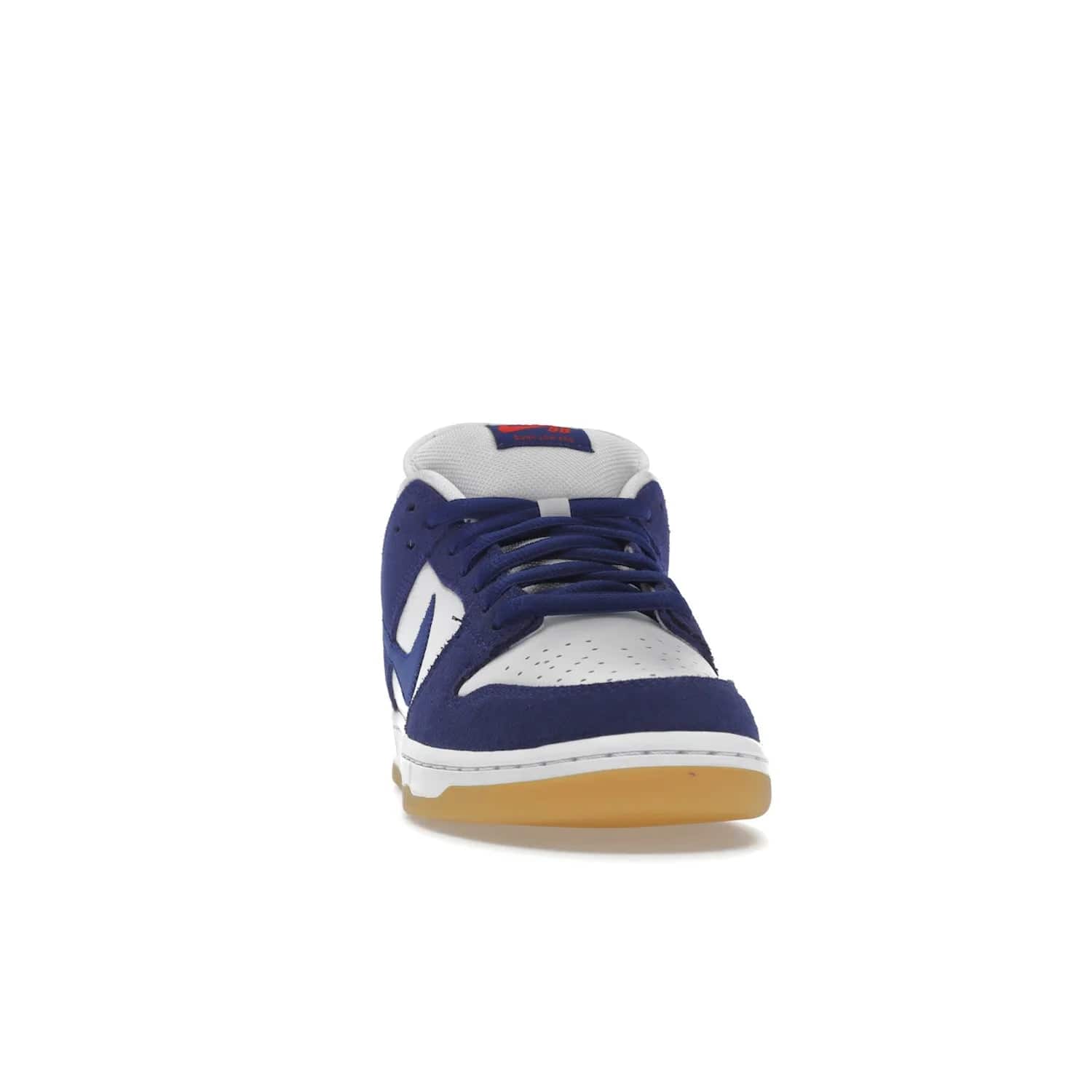 Nike SB Dunk Low Los Angeles Dodgers - Image 9 - Only at www.BallersClubKickz.com - Make a statement with the limited edition Nike SB Dunk Low Los Angeles Dodgers. Featuring a striking blue and white color combination, convenient lace-up closure, light-brown sole, and pink graphic, this stylish and comfortable low-top sneaker is perfect for sport fans and sneaker enthusiasts alike. Available in June 2022.