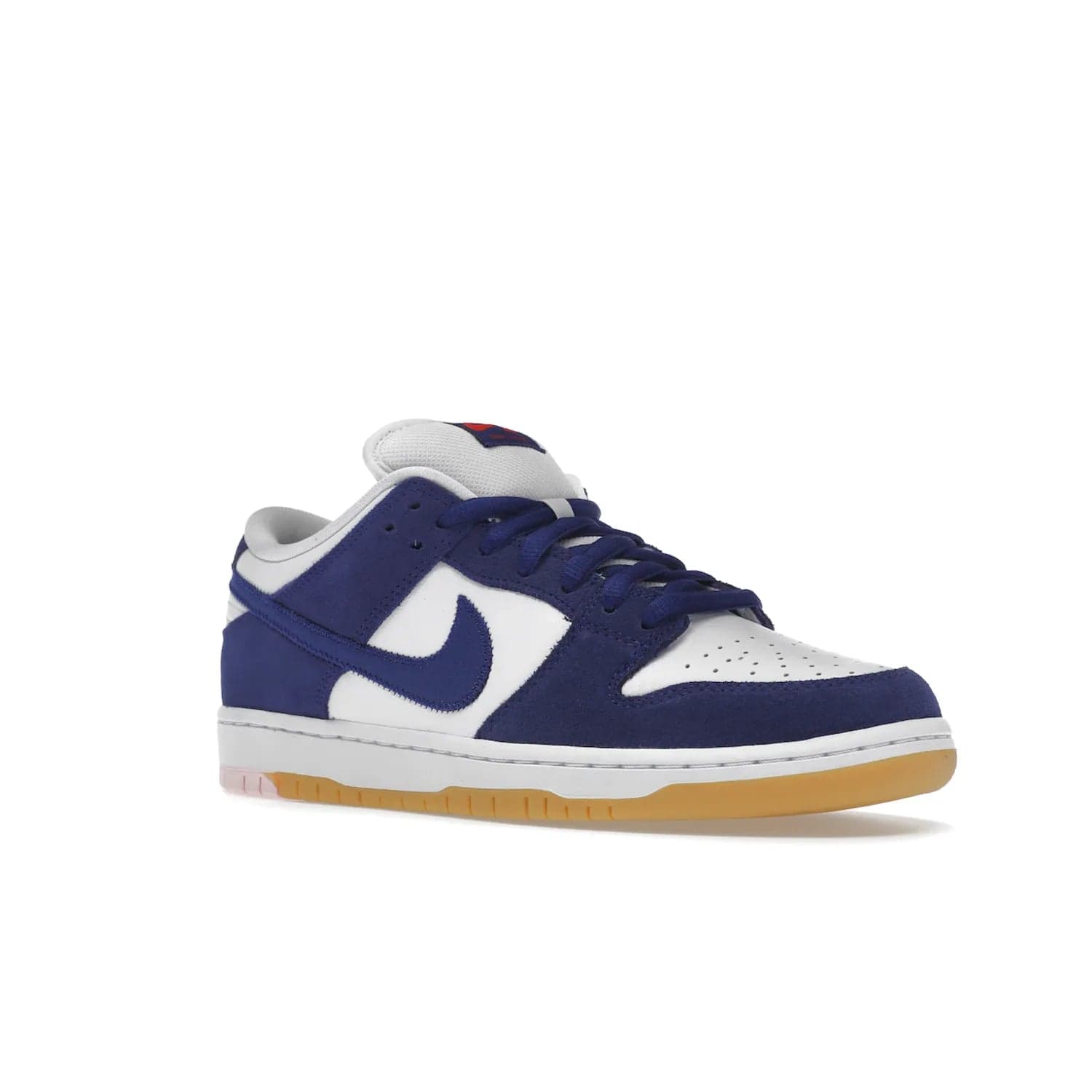 Nike SB Dunk Low Los Angeles Dodgers - Image 5 - Only at www.BallersClubKickz.com - Make a statement with the limited edition Nike SB Dunk Low Los Angeles Dodgers. Featuring a striking blue and white color combination, convenient lace-up closure, light-brown sole, and pink graphic, this stylish and comfortable low-top sneaker is perfect for sport fans and sneaker enthusiasts alike. Available in June 2022.