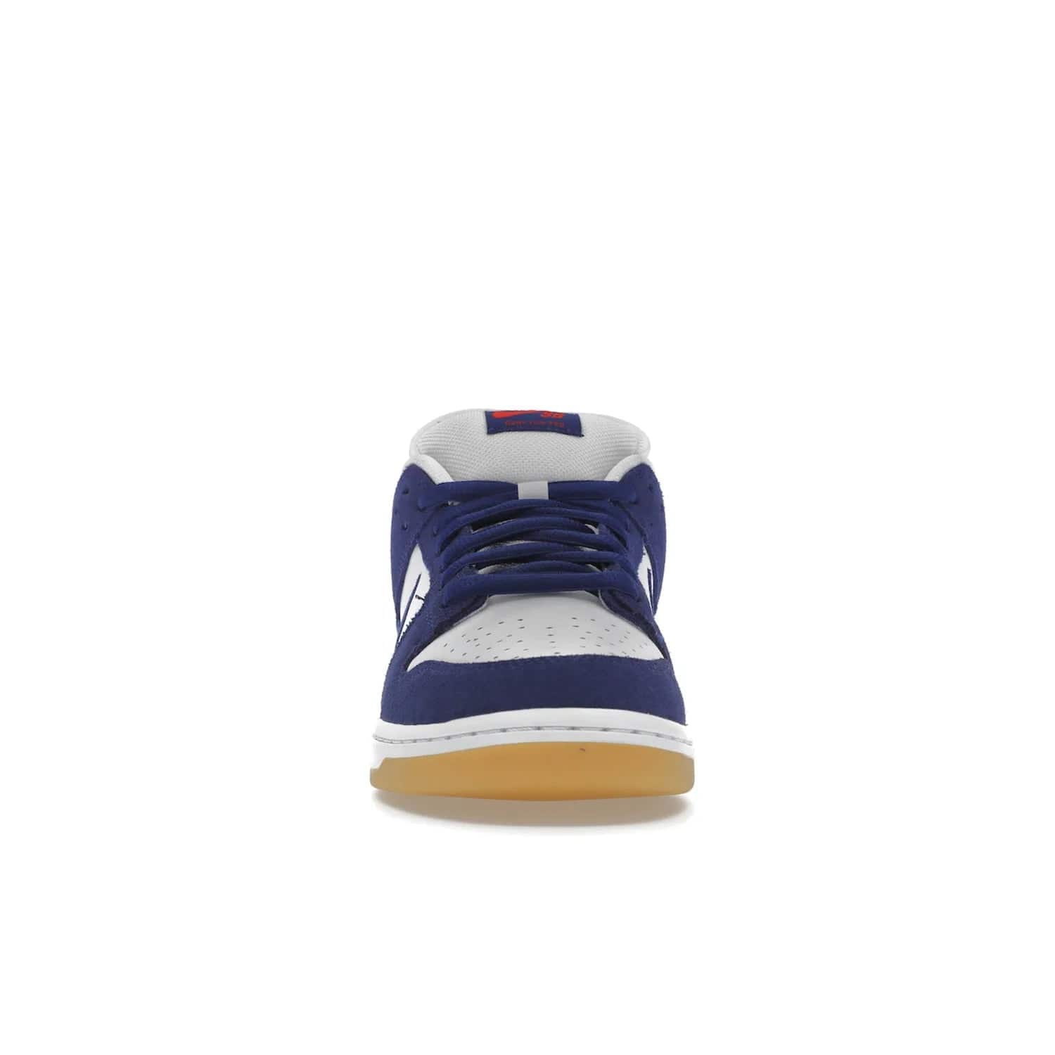 Nike SB Dunk Low Los Angeles Dodgers - Image 10 - Only at www.BallersClubKickz.com - Make a statement with the limited edition Nike SB Dunk Low Los Angeles Dodgers. Featuring a striking blue and white color combination, convenient lace-up closure, light-brown sole, and pink graphic, this stylish and comfortable low-top sneaker is perfect for sport fans and sneaker enthusiasts alike. Available in June 2022.