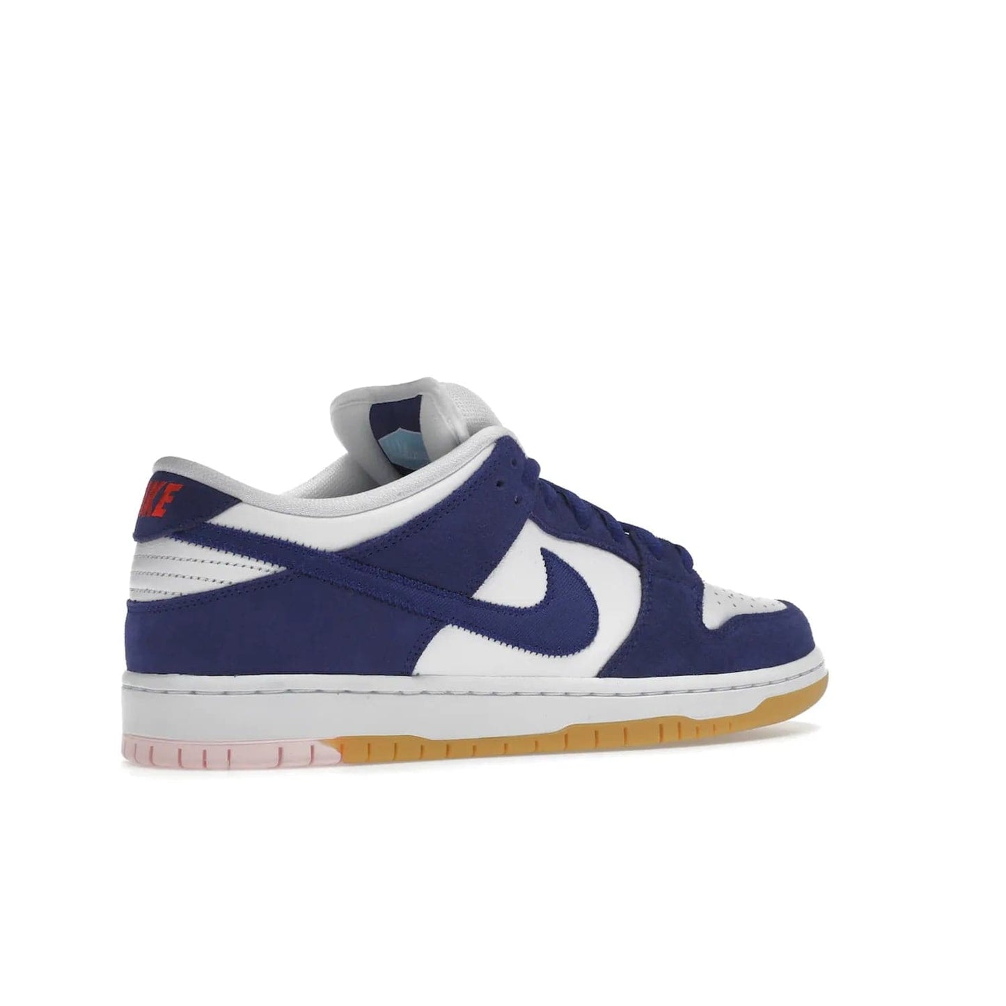 Nike SB Dunk Low Los Angeles Dodgers - Image 34 - Only at www.BallersClubKickz.com - Make a statement with the limited edition Nike SB Dunk Low Los Angeles Dodgers. Featuring a striking blue and white color combination, convenient lace-up closure, light-brown sole, and pink graphic, this stylish and comfortable low-top sneaker is perfect for sport fans and sneaker enthusiasts alike. Available in June 2022.