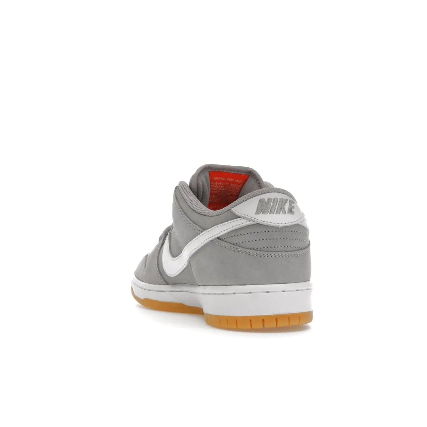 Nike SB Dunk Low Pro ISO Orange Label Wolf Grey Gum - Image 26 - Only at www.BallersClubKickz.com - Introducing Nike's SB Dunk Low Pro ISO Orange Label Wolf Grey Gum - a stylish shoe with a premium Wolf Grey upper, white leather Nike Swoosh, and an eye-catching gum outsole. With special Nike branding and packaging, this shoe adds a unique fashion statement. Out Feb. 24, 2023.