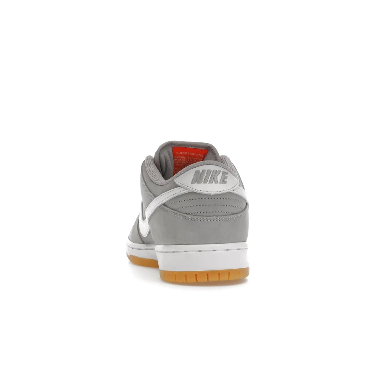 Nike SB Dunk Low Pro ISO Orange Label Wolf Grey Gum - Image 27 - Only at www.BallersClubKickz.com - Introducing Nike's SB Dunk Low Pro ISO Orange Label Wolf Grey Gum - a stylish shoe with a premium Wolf Grey upper, white leather Nike Swoosh, and an eye-catching gum outsole. With special Nike branding and packaging, this shoe adds a unique fashion statement. Out Feb. 24, 2023.