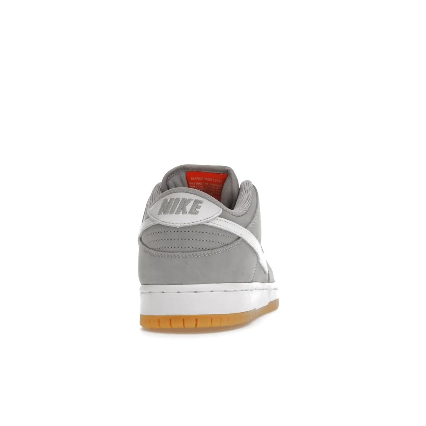Nike SB Dunk Low Pro ISO Orange Label Wolf Grey Gum - Image 29 - Only at www.BallersClubKickz.com - Introducing Nike's SB Dunk Low Pro ISO Orange Label Wolf Grey Gum - a stylish shoe with a premium Wolf Grey upper, white leather Nike Swoosh, and an eye-catching gum outsole. With special Nike branding and packaging, this shoe adds a unique fashion statement. Out Feb. 24, 2023.