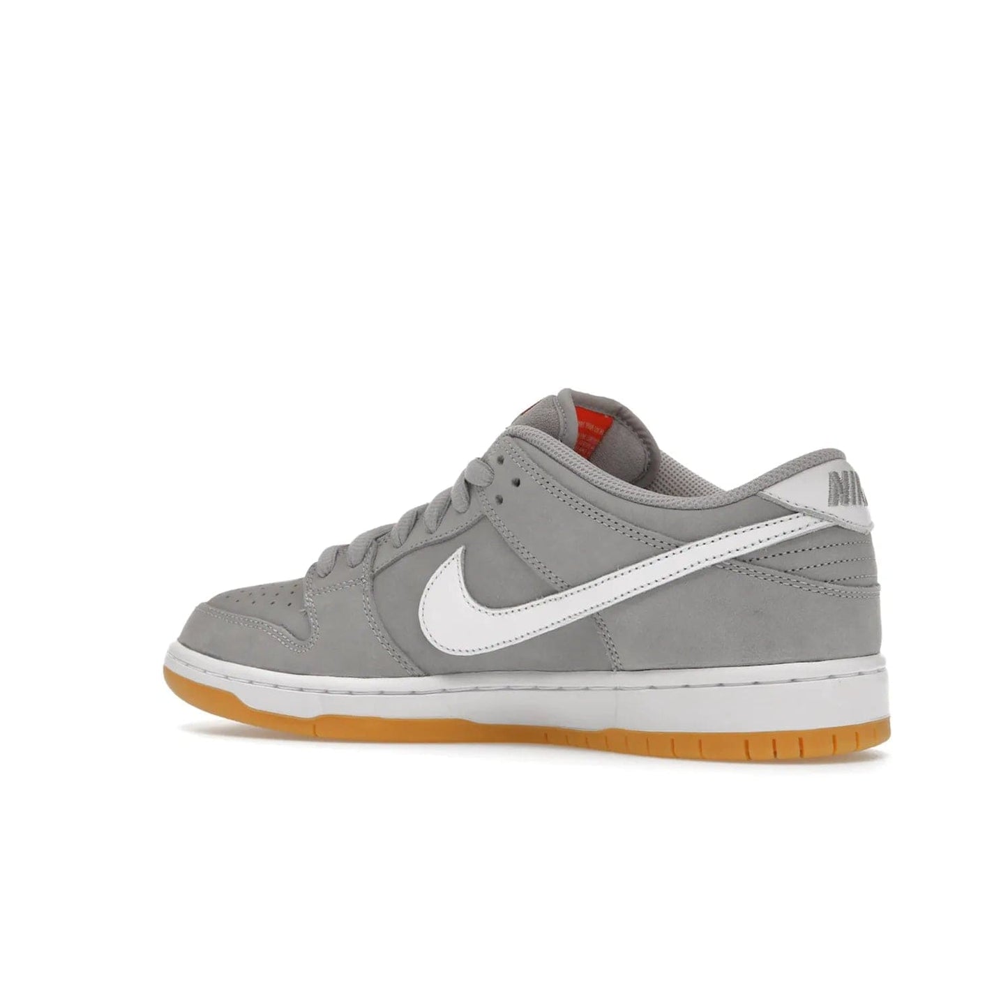 Nike SB Dunk Low Pro ISO Orange Label Wolf Grey Gum - Image 22 - Only at www.BallersClubKickz.com - Introducing Nike's SB Dunk Low Pro ISO Orange Label Wolf Grey Gum - a stylish shoe with a premium Wolf Grey upper, white leather Nike Swoosh, and an eye-catching gum outsole. With special Nike branding and packaging, this shoe adds a unique fashion statement. Out Feb. 24, 2023.