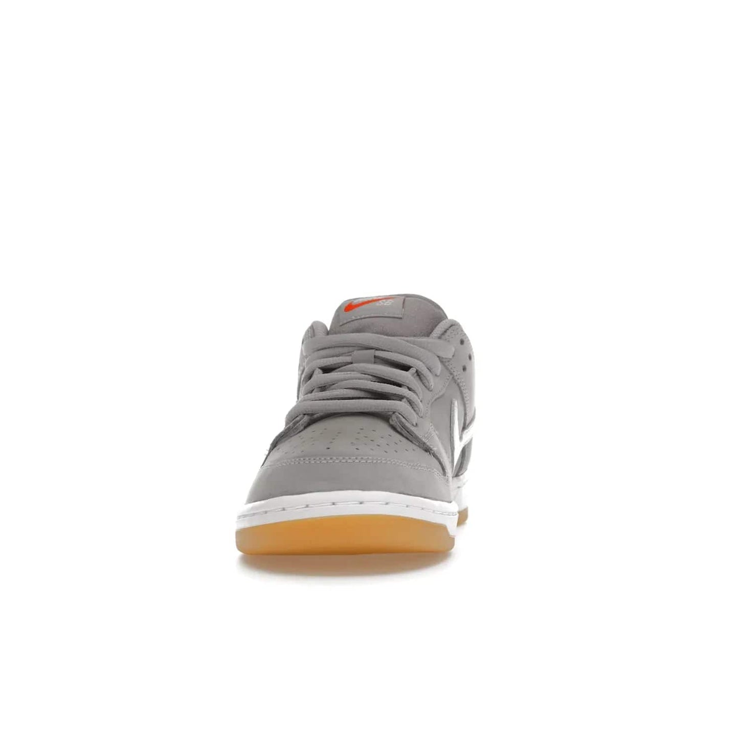 Nike SB Dunk Low Pro ISO Orange Label Wolf Grey Gum - Image 11 - Only at www.BallersClubKickz.com - Introducing Nike's SB Dunk Low Pro ISO Orange Label Wolf Grey Gum - a stylish shoe with a premium Wolf Grey upper, white leather Nike Swoosh, and an eye-catching gum outsole. With special Nike branding and packaging, this shoe adds a unique fashion statement. Out Feb. 24, 2023.