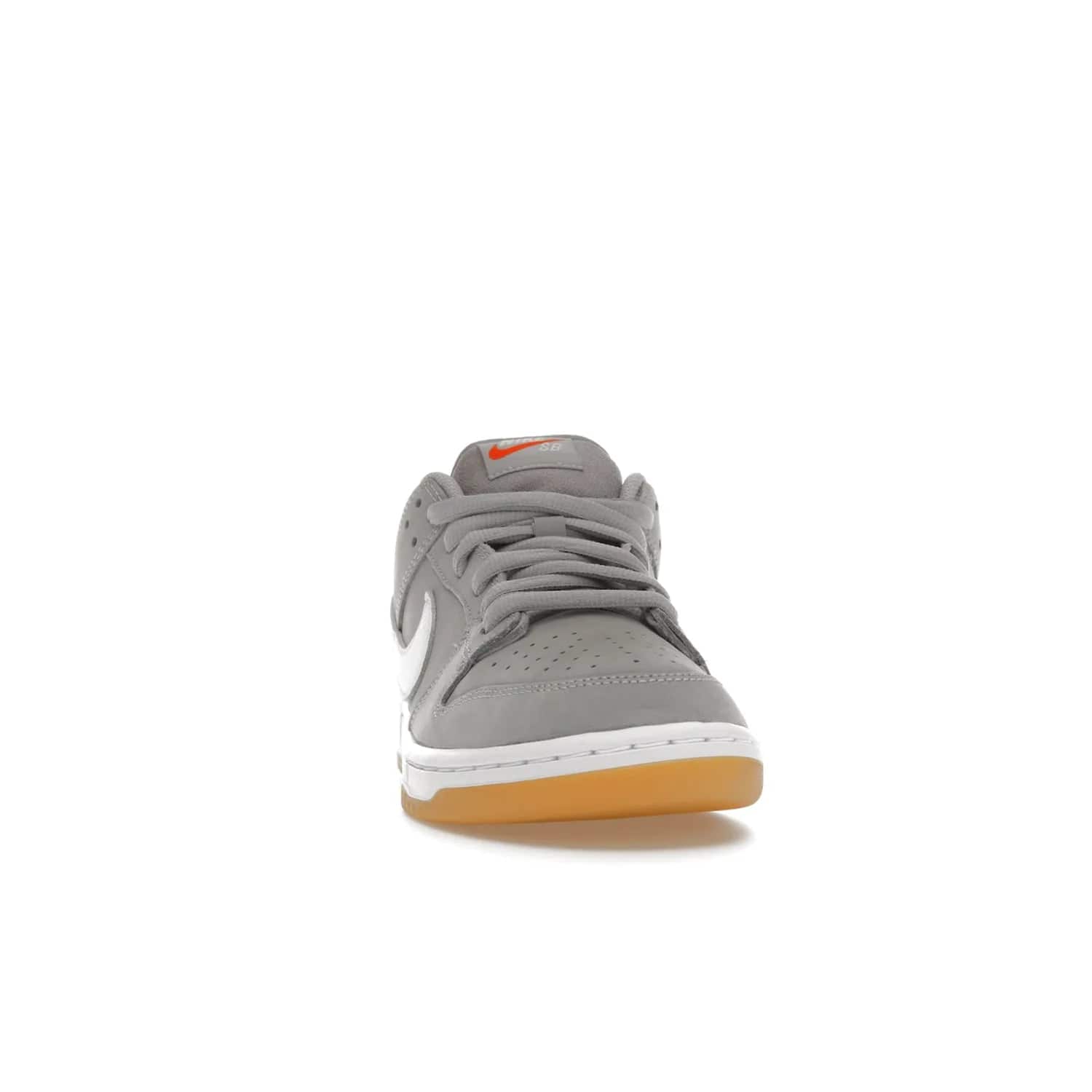 Nike SB Dunk Low Pro ISO Orange Label Wolf Grey Gum - Image 9 - Only at www.BallersClubKickz.com - Introducing Nike's SB Dunk Low Pro ISO Orange Label Wolf Grey Gum - a stylish shoe with a premium Wolf Grey upper, white leather Nike Swoosh, and an eye-catching gum outsole. With special Nike branding and packaging, this shoe adds a unique fashion statement. Out Feb. 24, 2023.