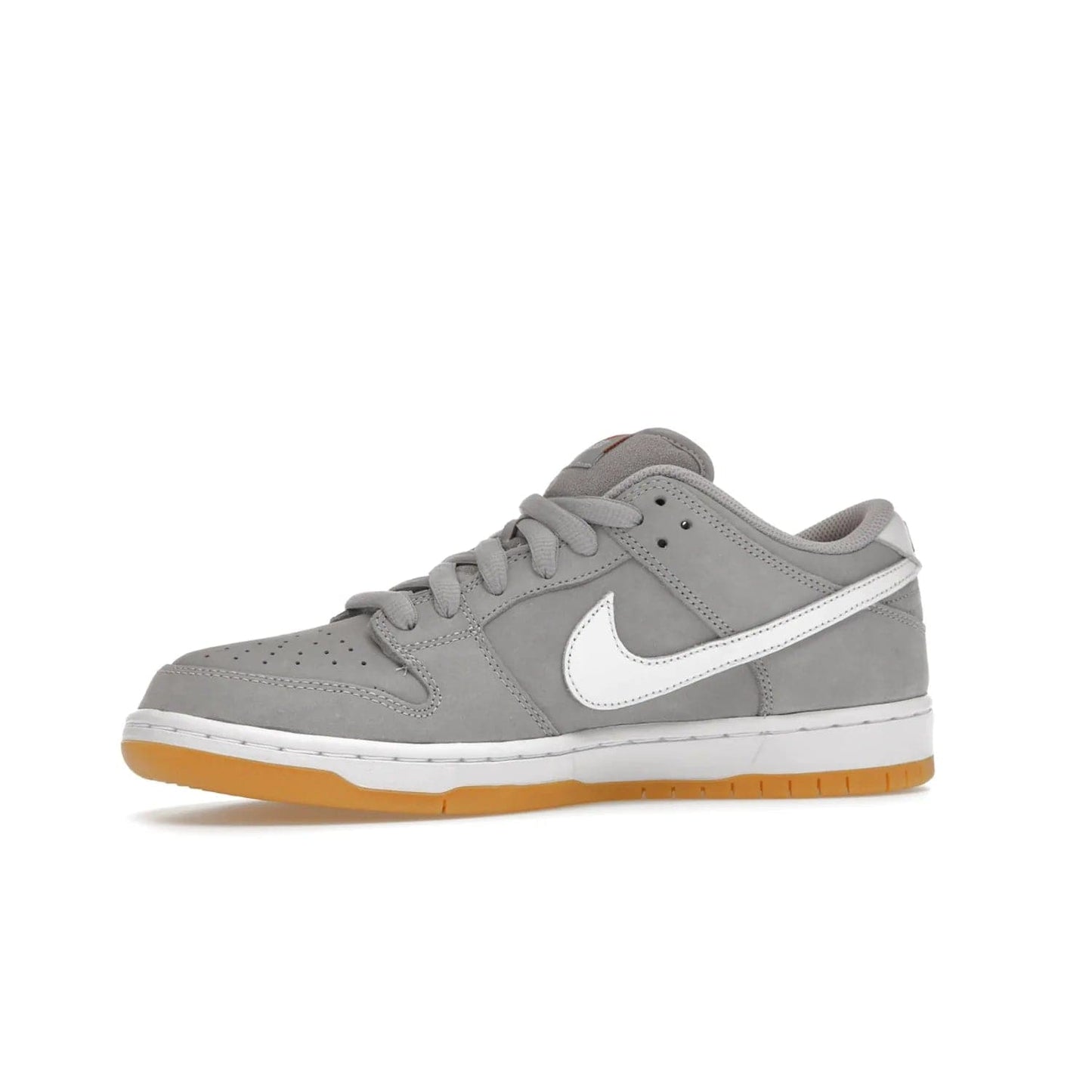Nike SB Dunk Low Pro ISO Orange Label Wolf Grey Gum - Image 17 - Only at www.BallersClubKickz.com - Introducing Nike's SB Dunk Low Pro ISO Orange Label Wolf Grey Gum - a stylish shoe with a premium Wolf Grey upper, white leather Nike Swoosh, and an eye-catching gum outsole. With special Nike branding and packaging, this shoe adds a unique fashion statement. Out Feb. 24, 2023.